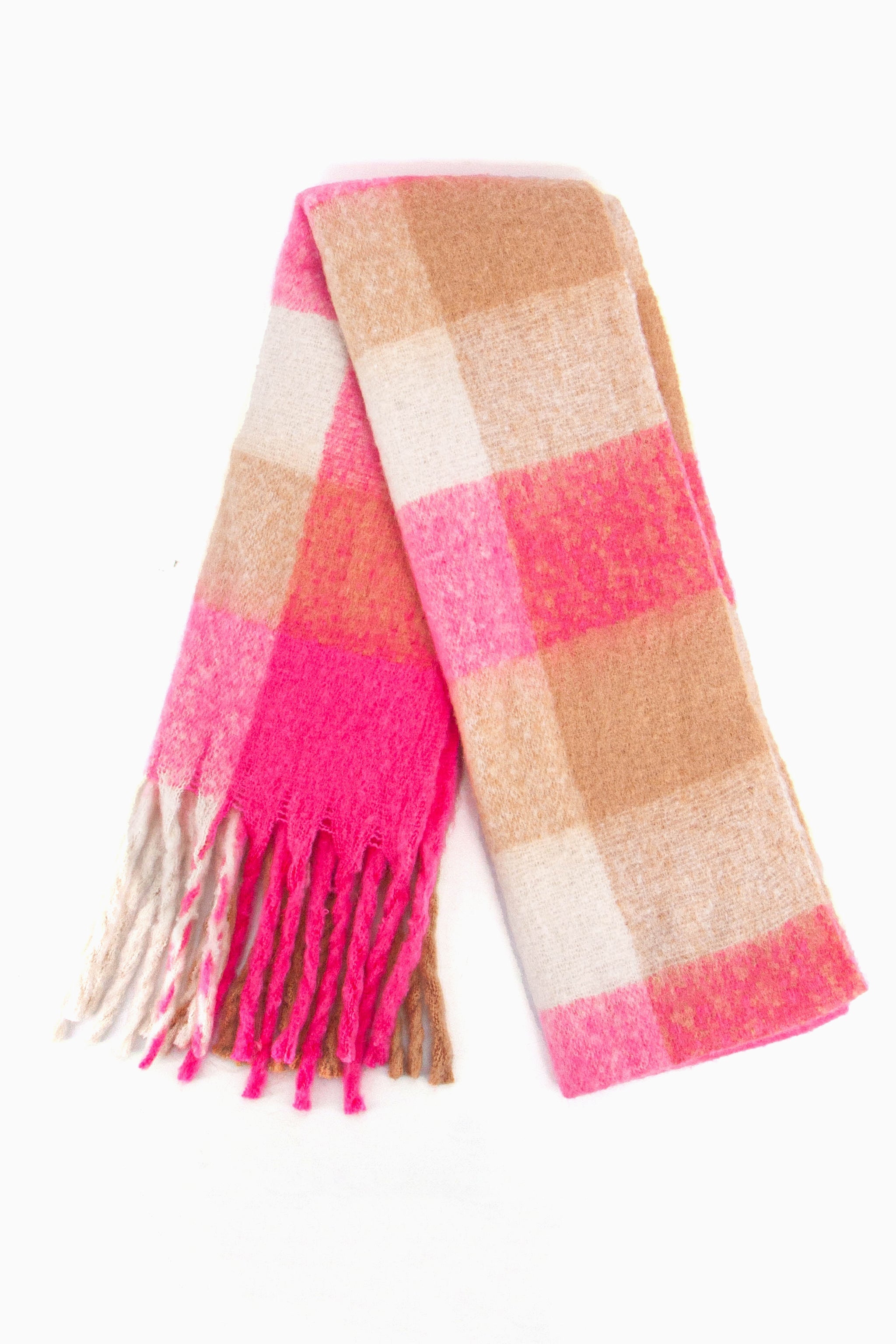 showing the scarf folded while laying flat, the multi colour square block pattern is highlighted. there are pink, cream and beige tones visible in the design.