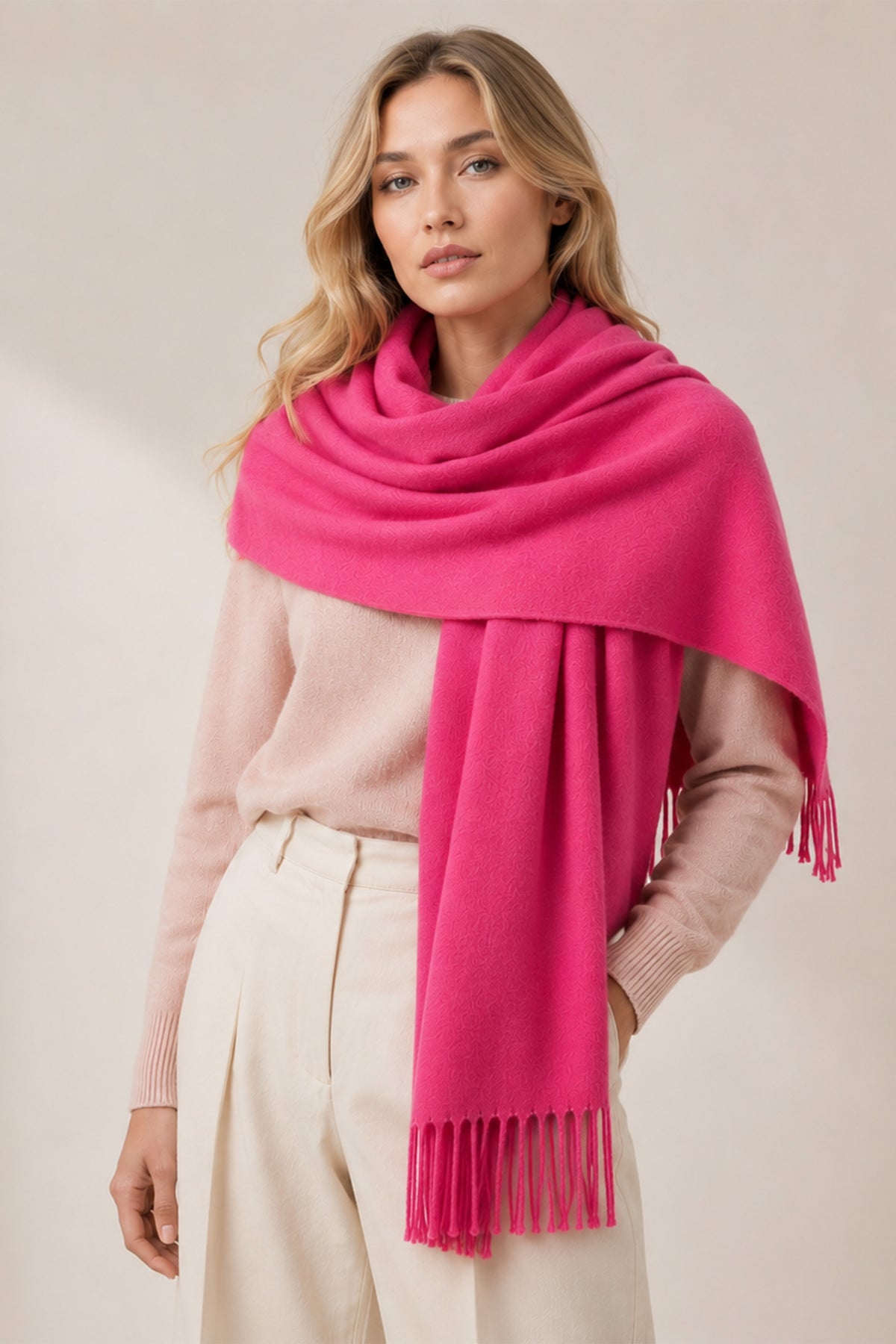 plain hot pink winter scarf with a tasselled fringe