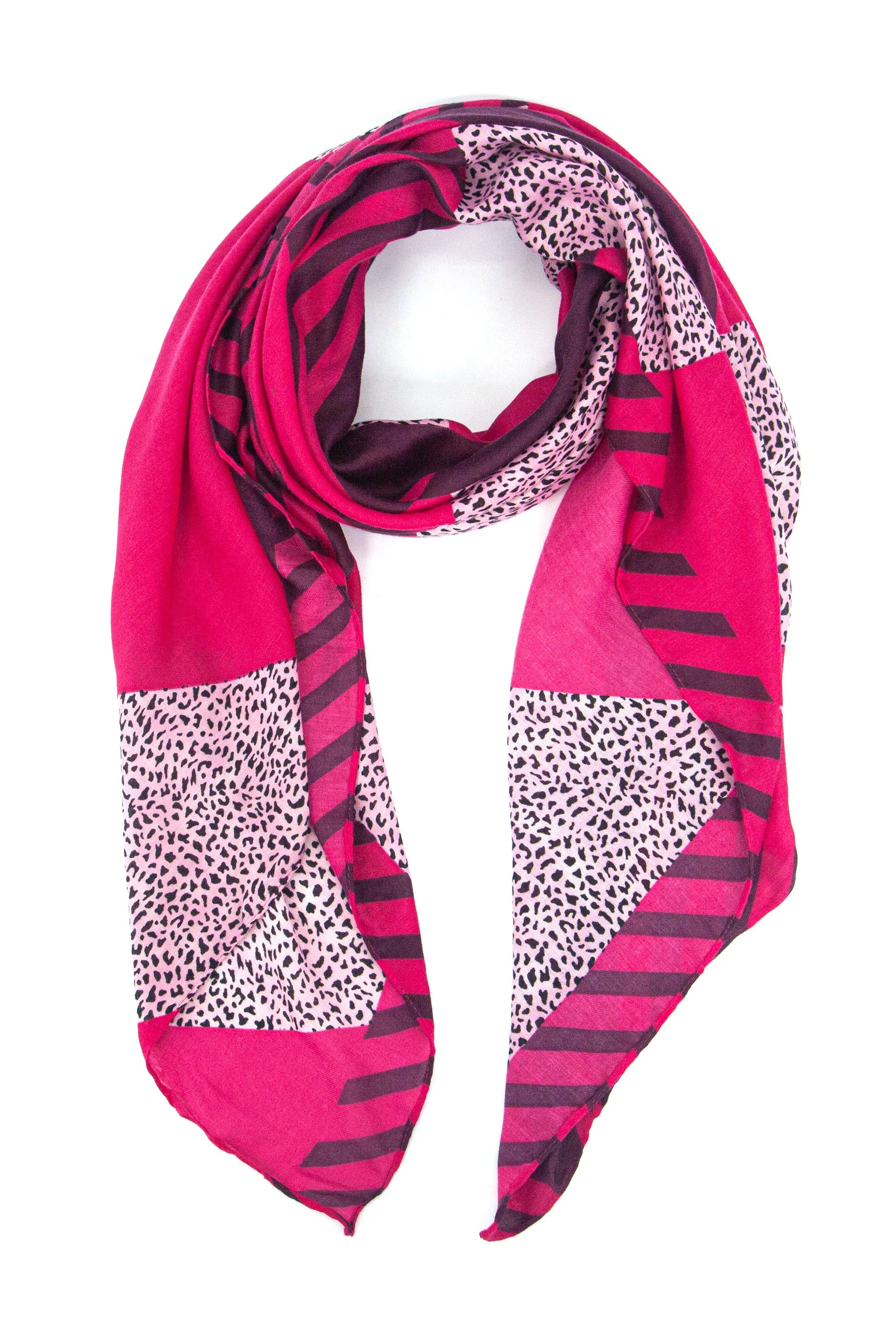 fuchsia pink scarf in a block print pattern with striped and contrasting neutral animal print