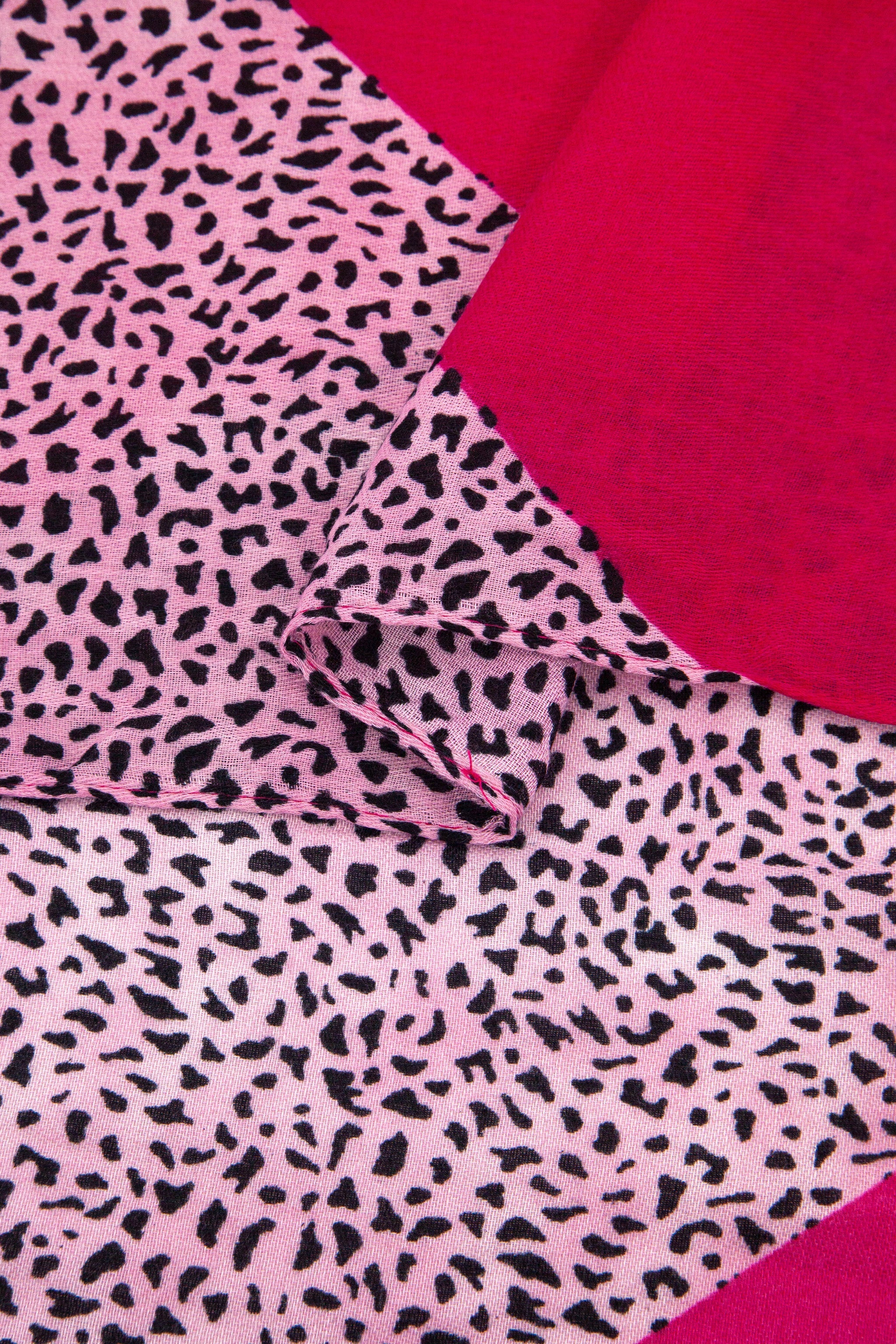close up of the soft viscose fabric, the contrasting print is clearly visible