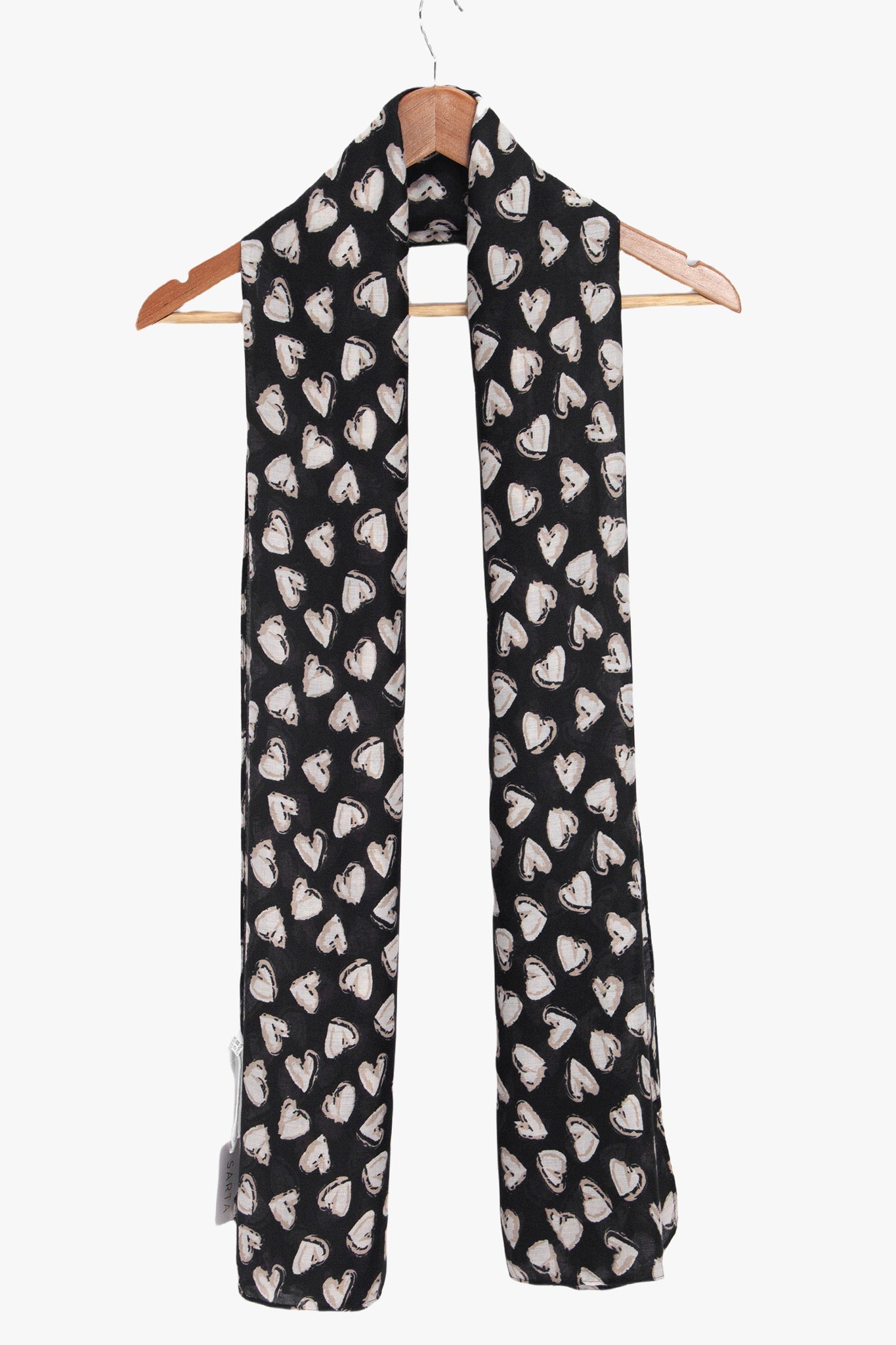 kara-black-white-hearts-lightweight-scarf-draped-coat-hanger