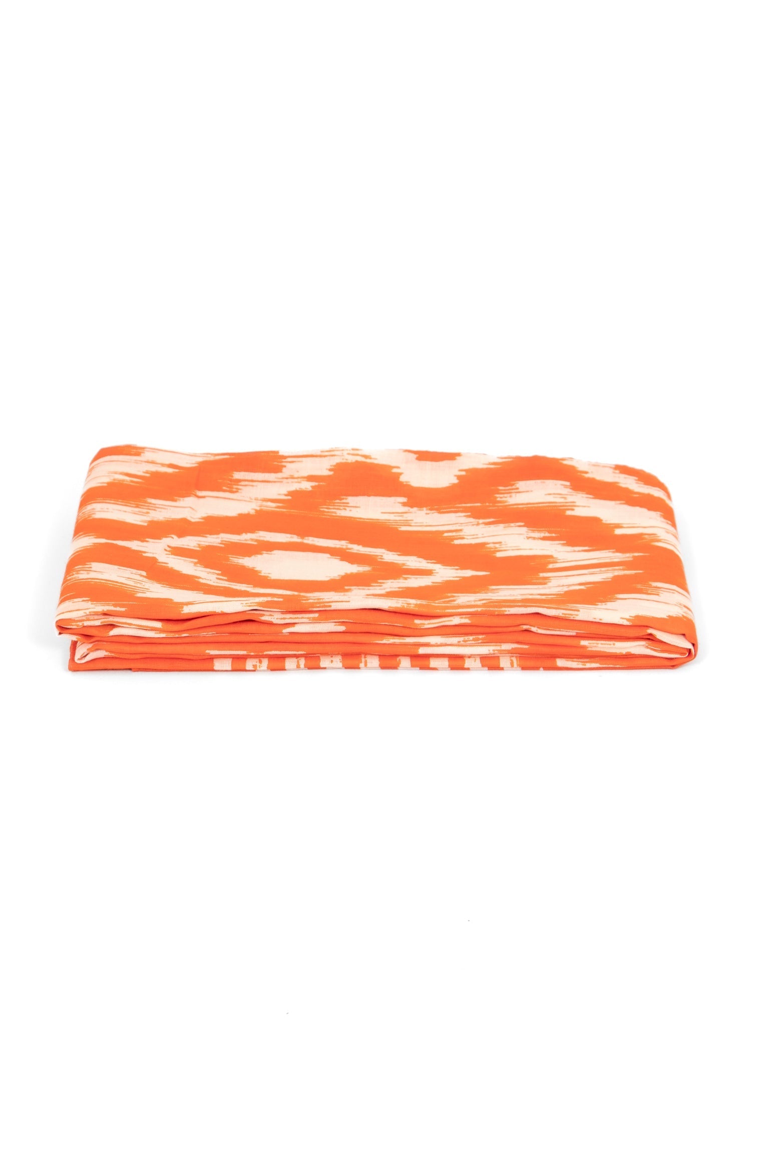 side view of the scarf when folded, showing the texture and thickness of the material. this scarf is lightweight