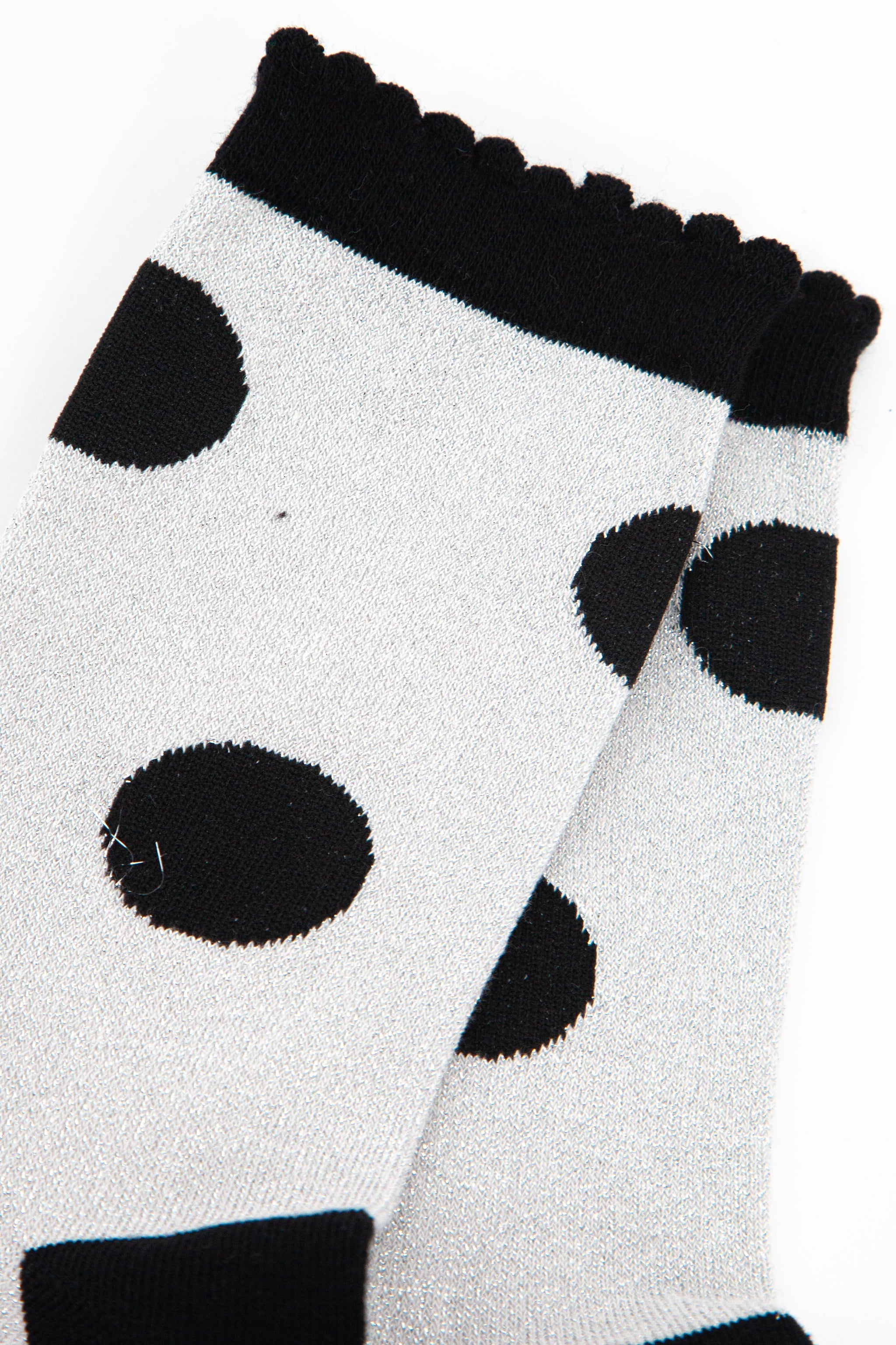 close up of the all over glitter sparkly material of the ankle socks