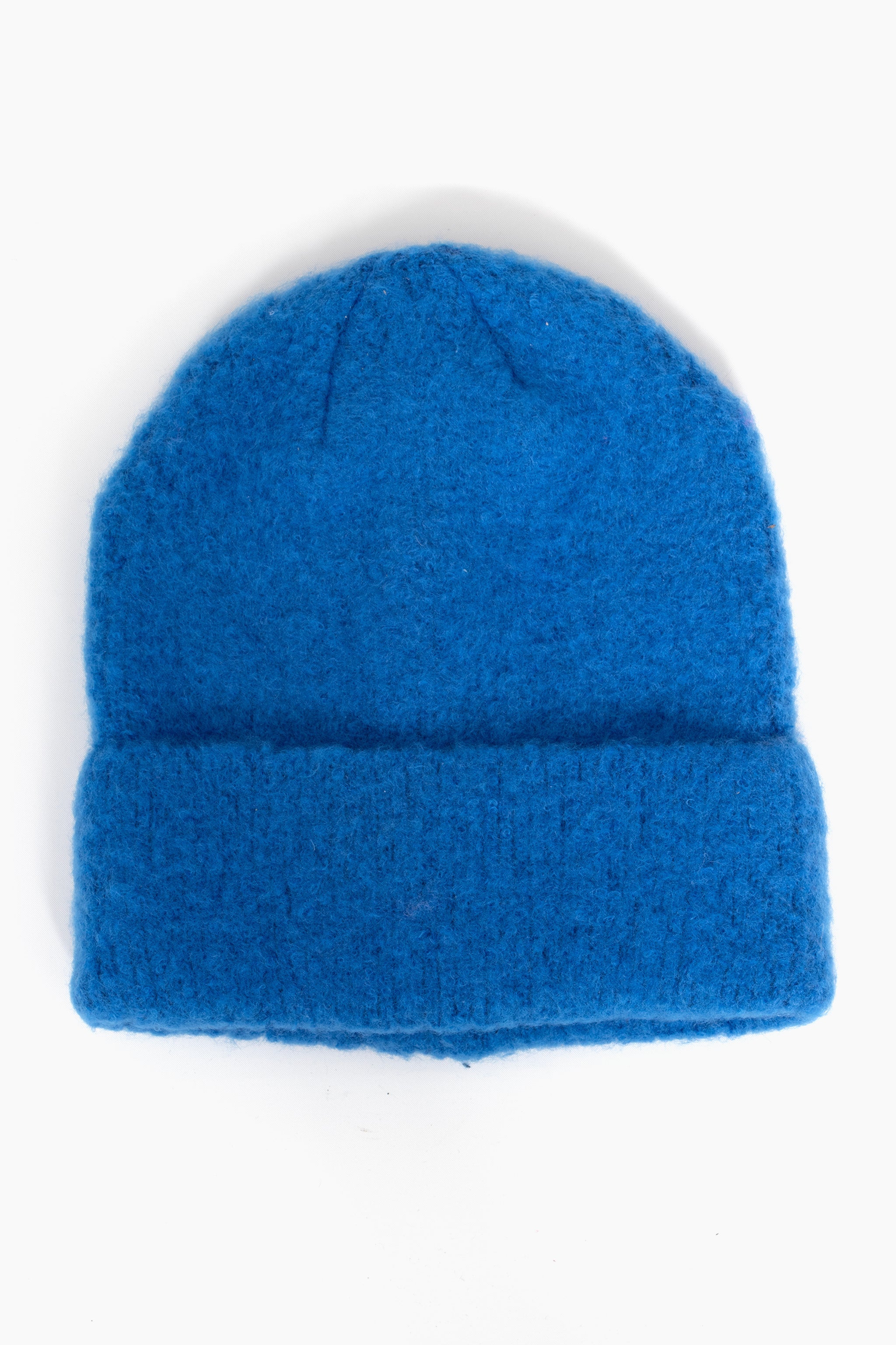 royal blue textured knitted beanie hat with a foldable brim