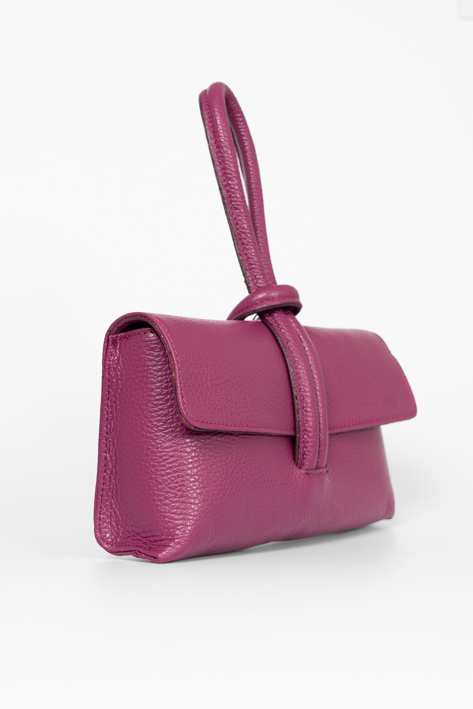 trixie-berry-pebbled-italian-leather-clutch-bag-side-view-loop-handle