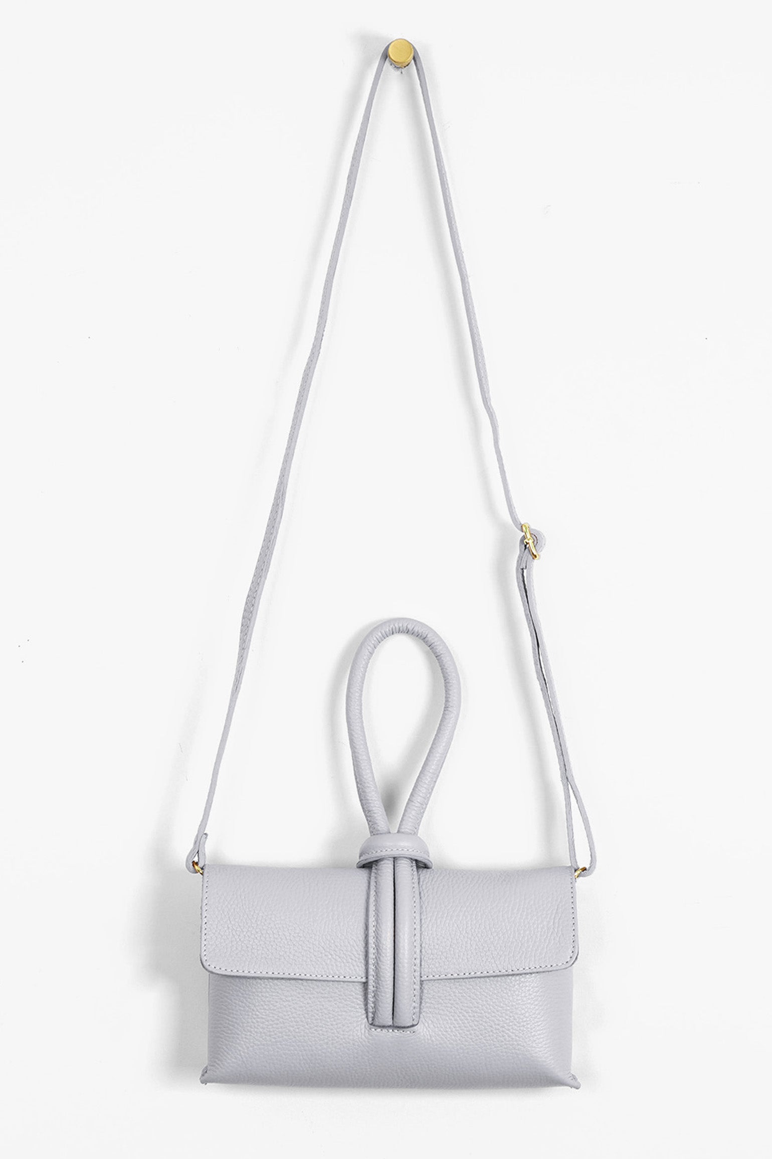 Trixie-Clutch-Bag-Pebbled-Italian-Leather-in-Light-Grey-Front-Showing-Adjustable-Strap