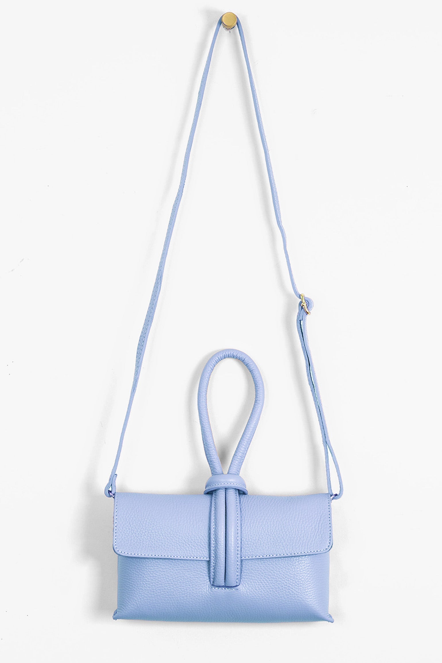 Trixie-Clutch-Bag-Pebbled-Italian-Leather-in-Powder-Blue-Front-Showing-Adjustable-Strap