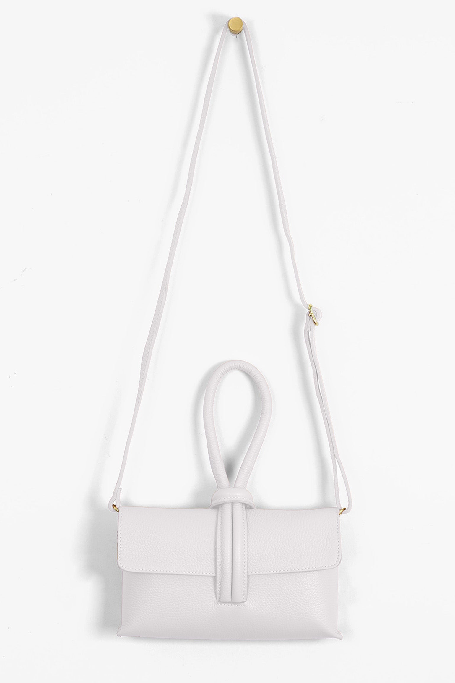 Trixie-Clutch-Bag-Pebbled-Italian-Leather-in-White-Front-Showing-Adjustable-Strap