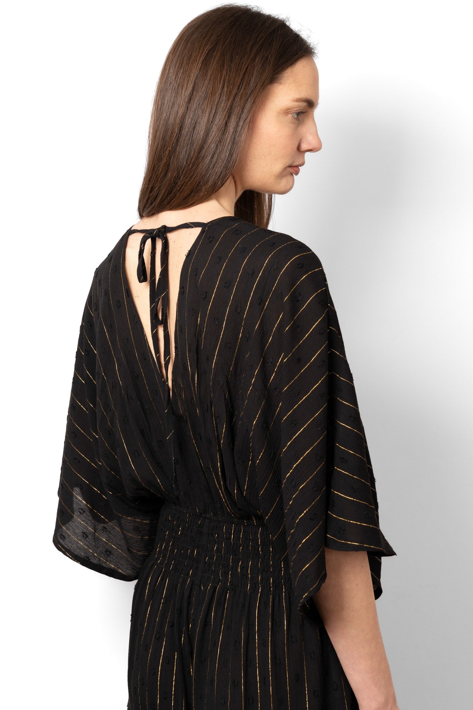 lyra-deep-v-neck-jumpsuit-black-metallic-stripe-rear-neck-tie