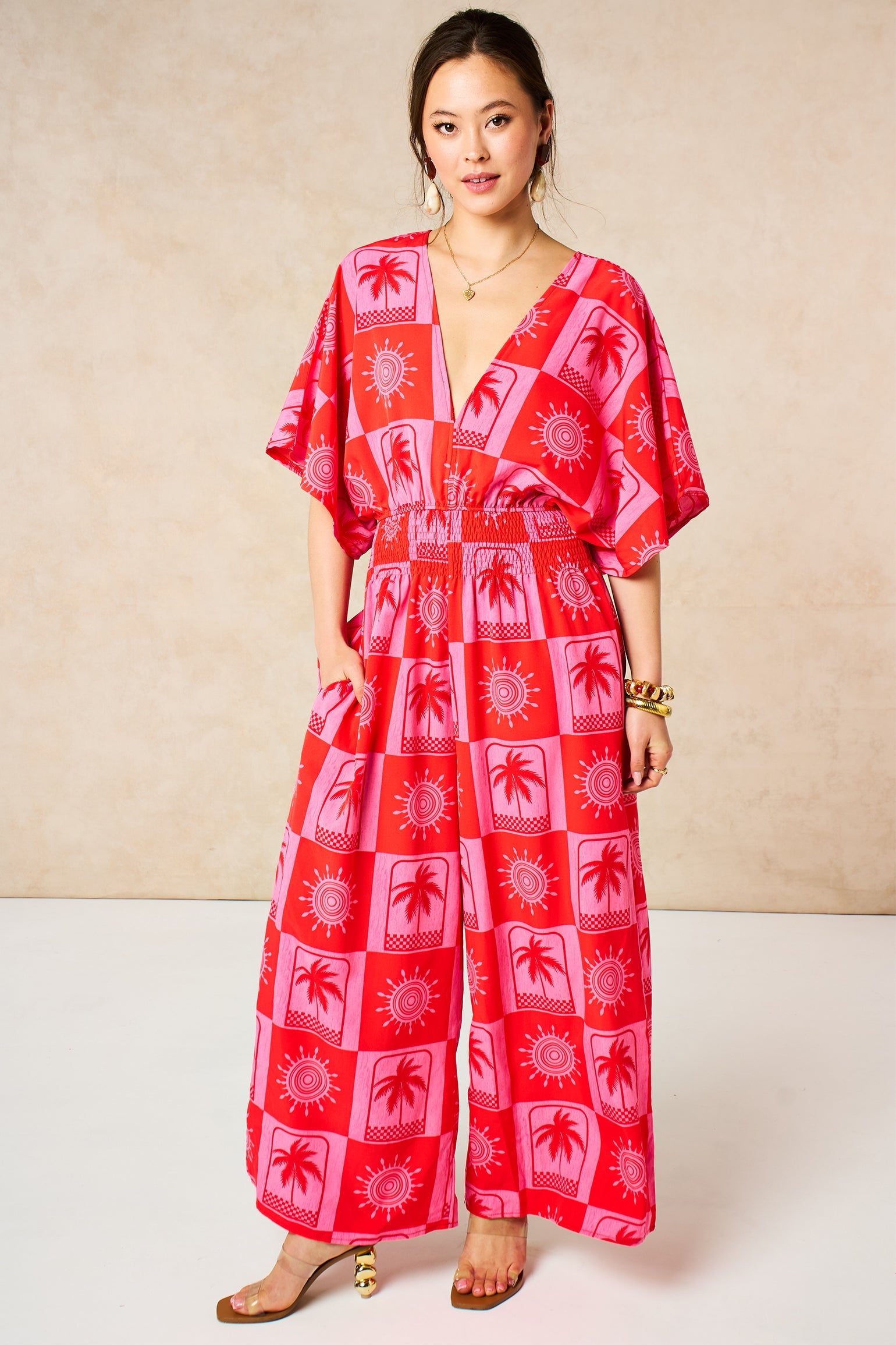 Palm-Tree-Checkerboard-V-Neck-Jumpsuit-in-Hot-Pink