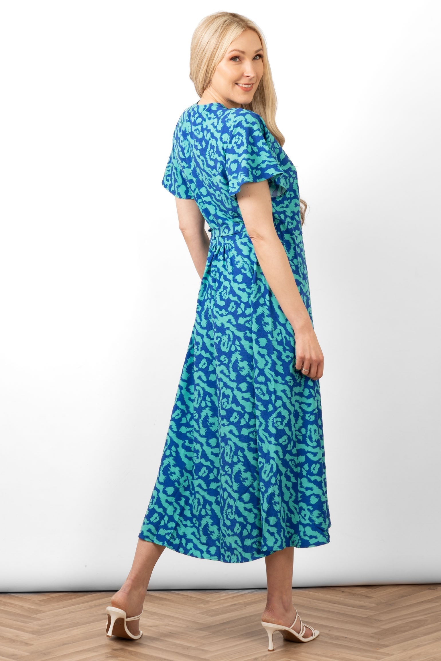 addie-short-sleeve-wrap-dress-blue-animal-print-rear-view
