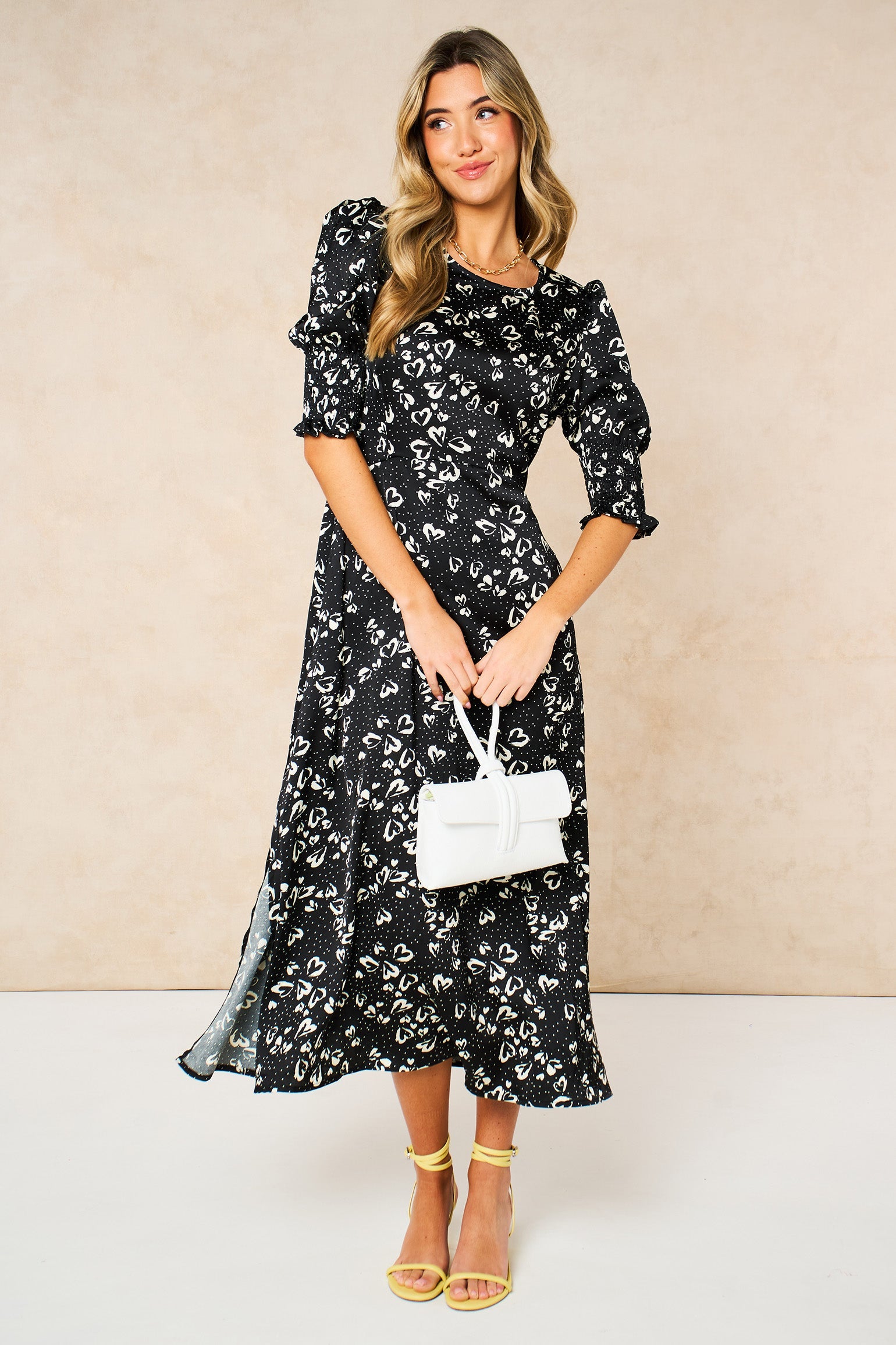 Love-Hearts-Midi-Tea-Dress-in-Black-front-with-trixie-in-white