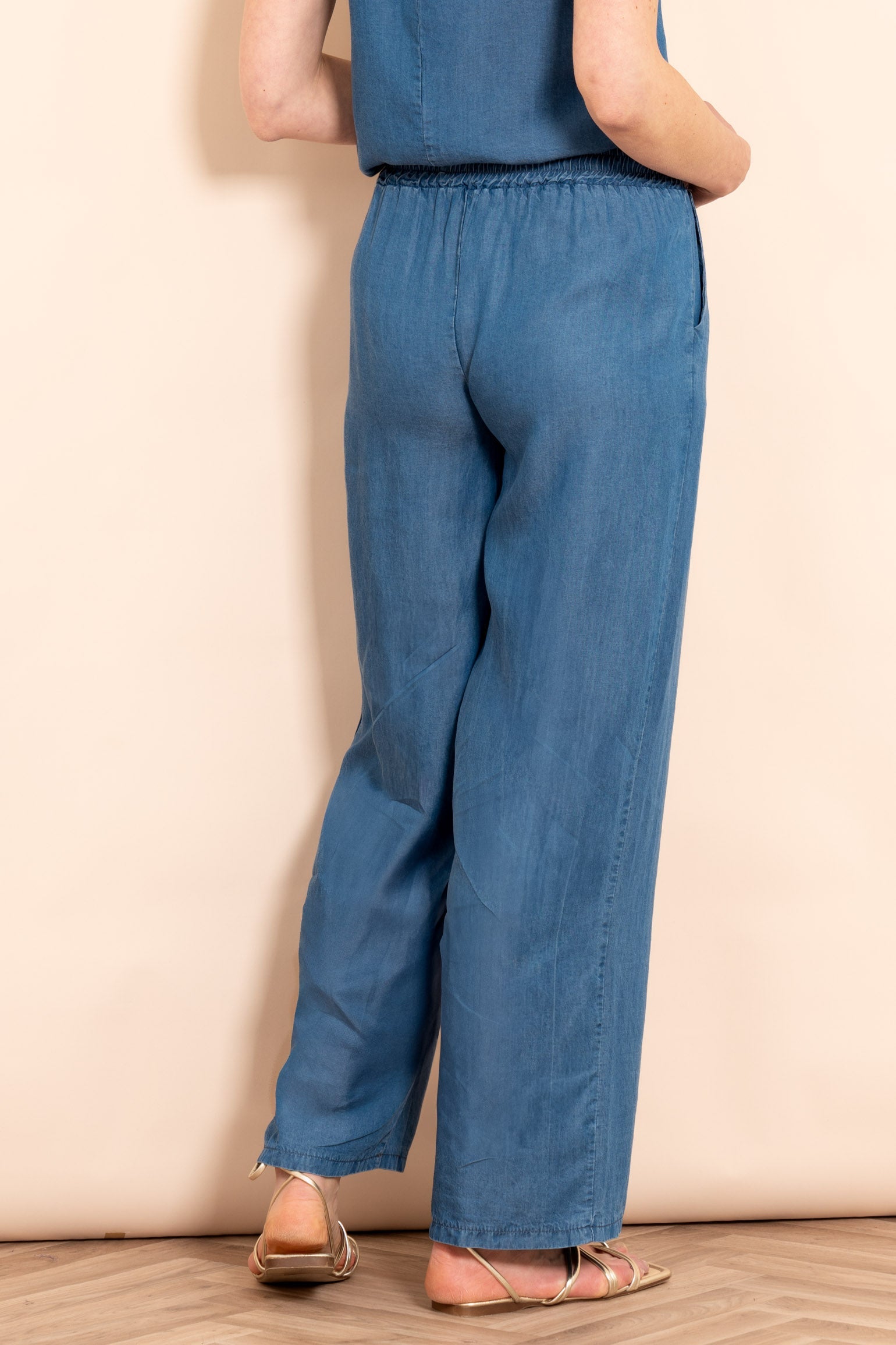 ezra-wide-leg-trousers-blue-chambray-rear-view