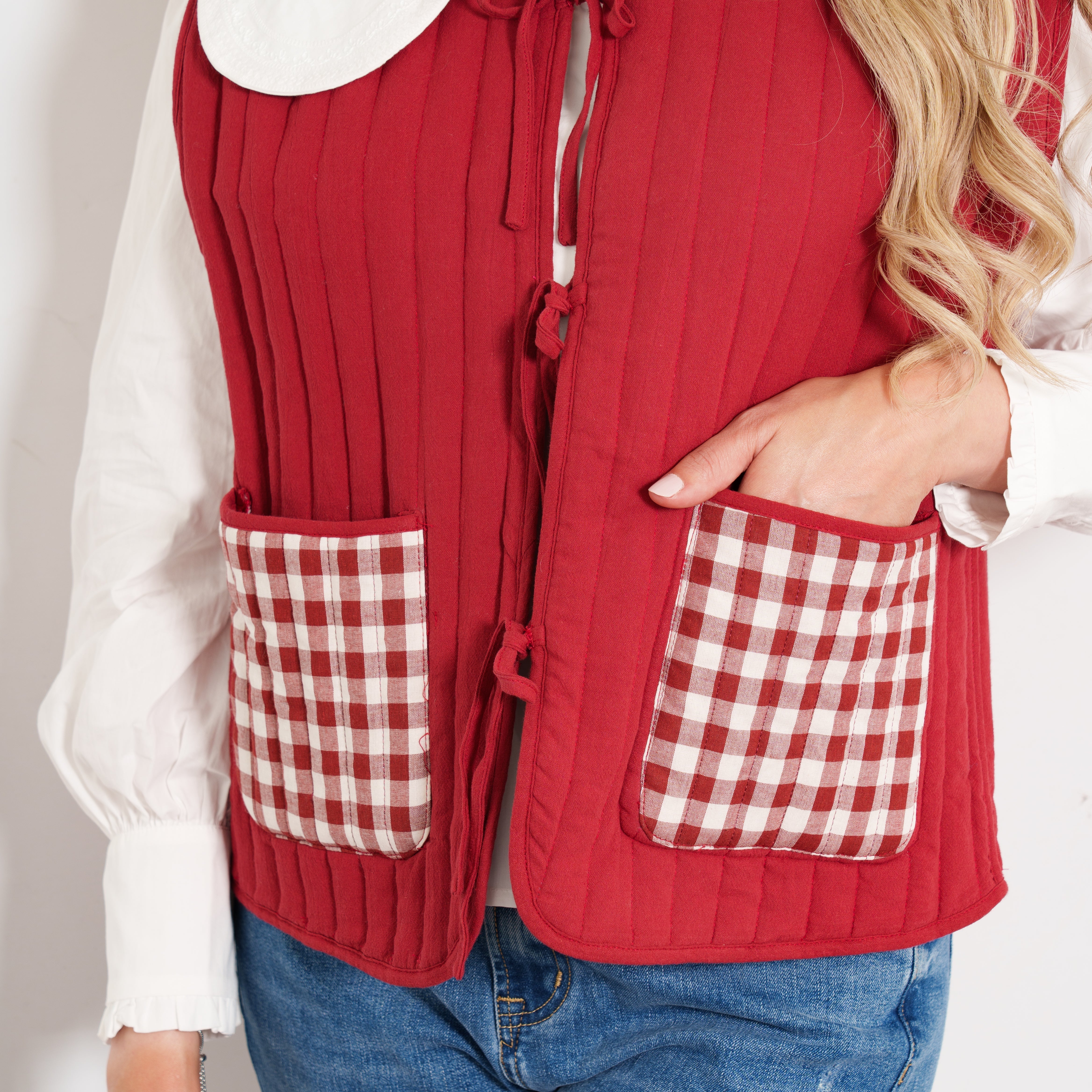 tabby-quilted-reversible-gilet-red-cream-gingham-close-up-pockets