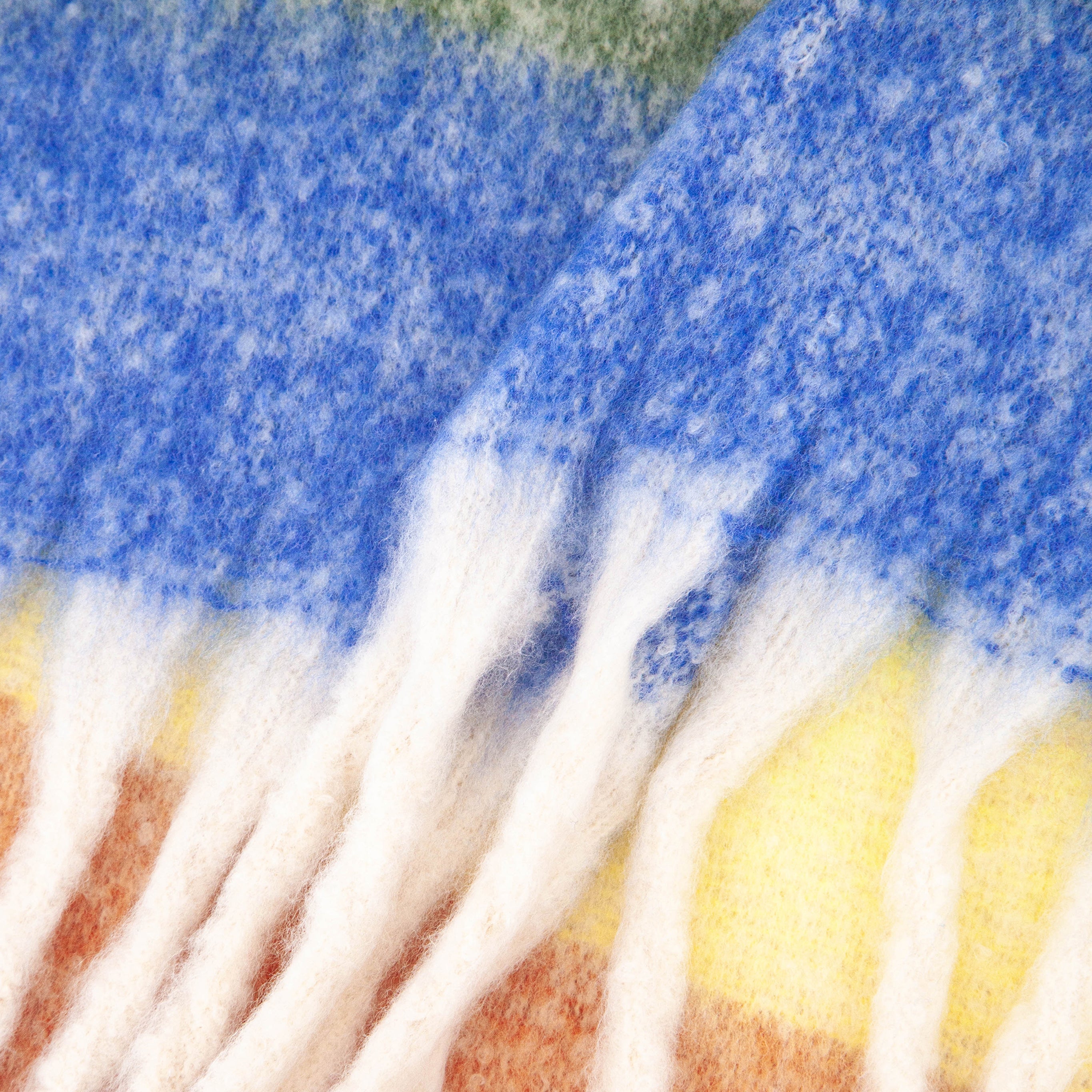 close up of the soft viscose knitted material of the winter blanket scarf