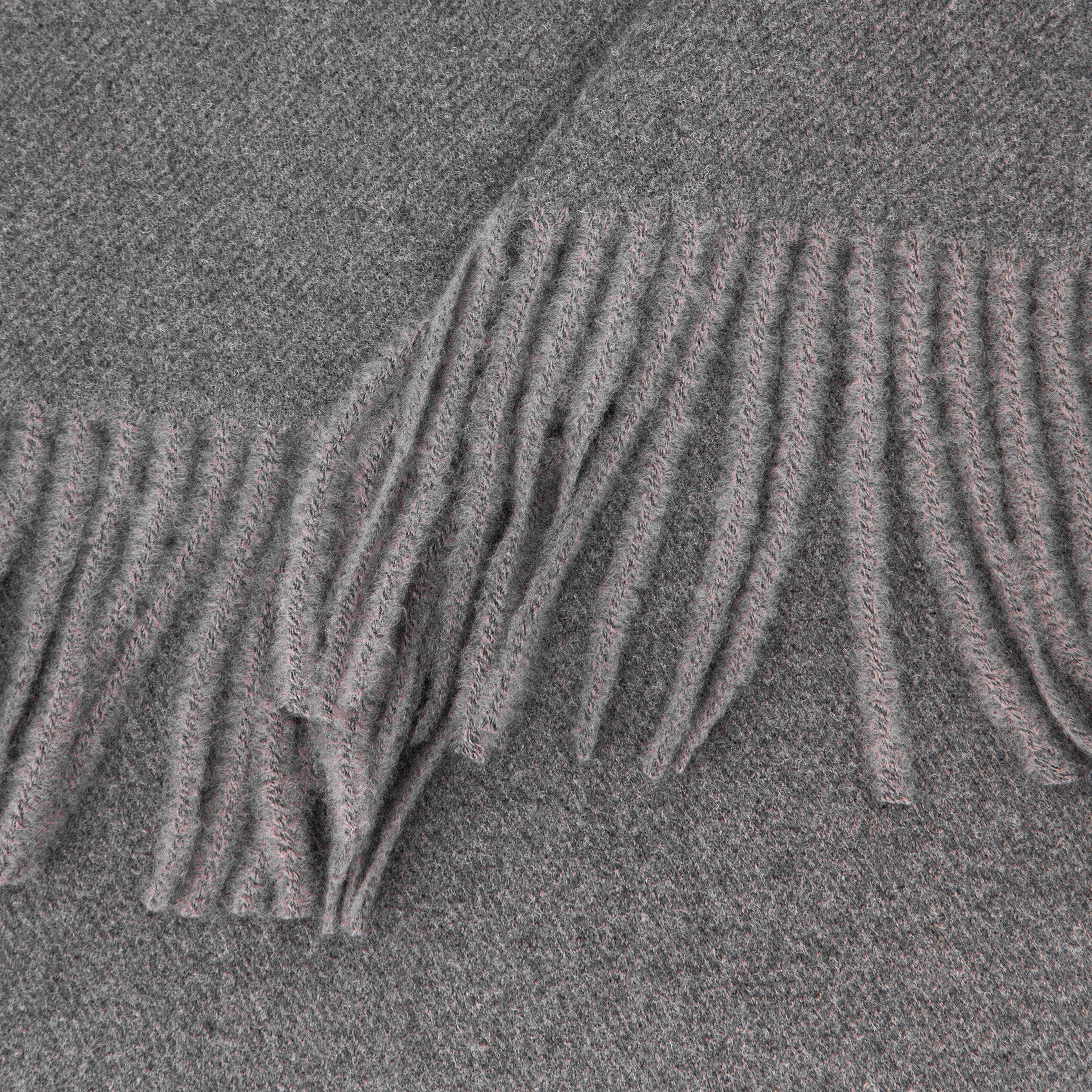 close up of the soft viscose knitted material of the winter blanket scarf