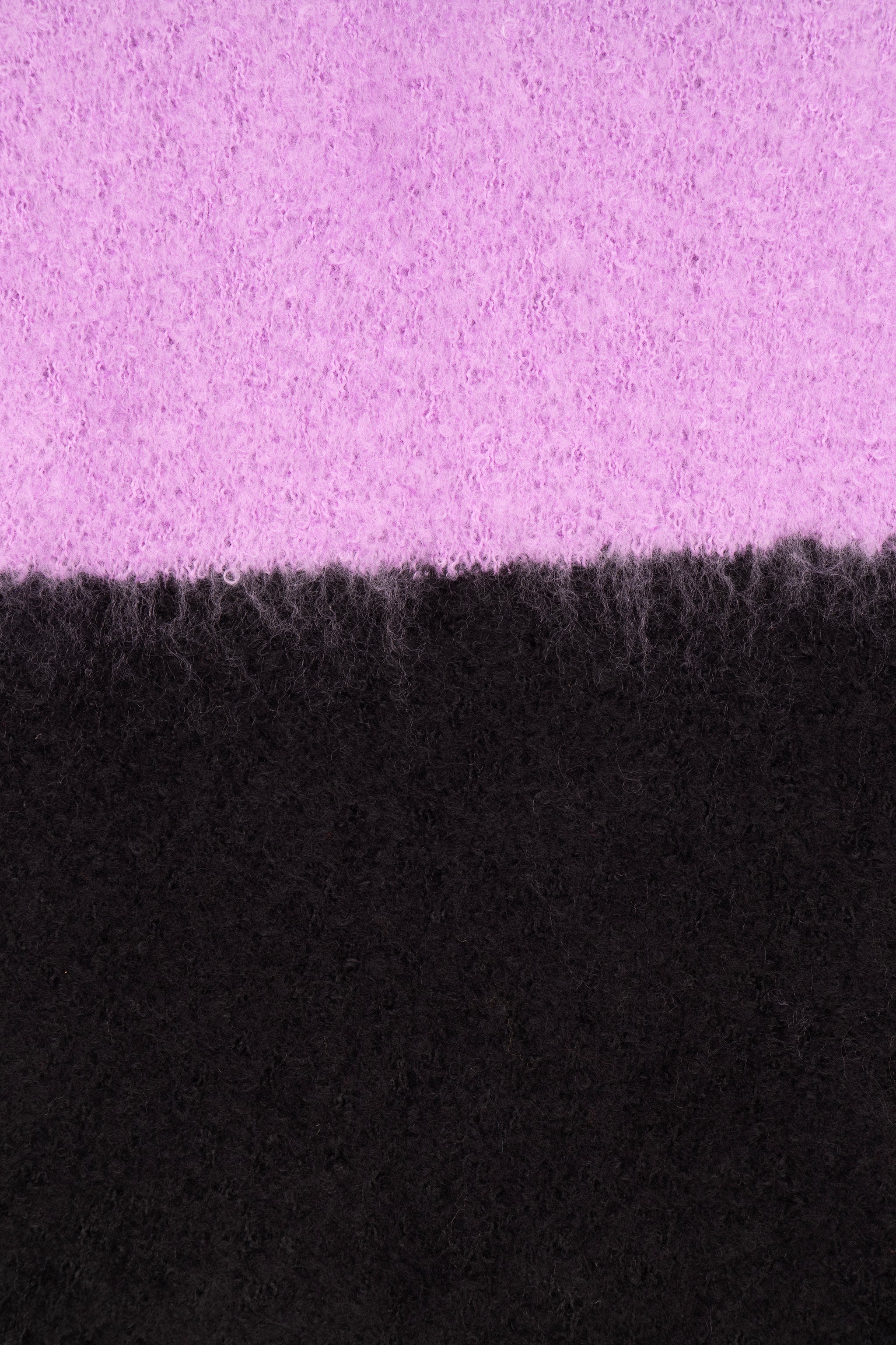 close up of the soft viscose knitted material of the winter blanket scarf