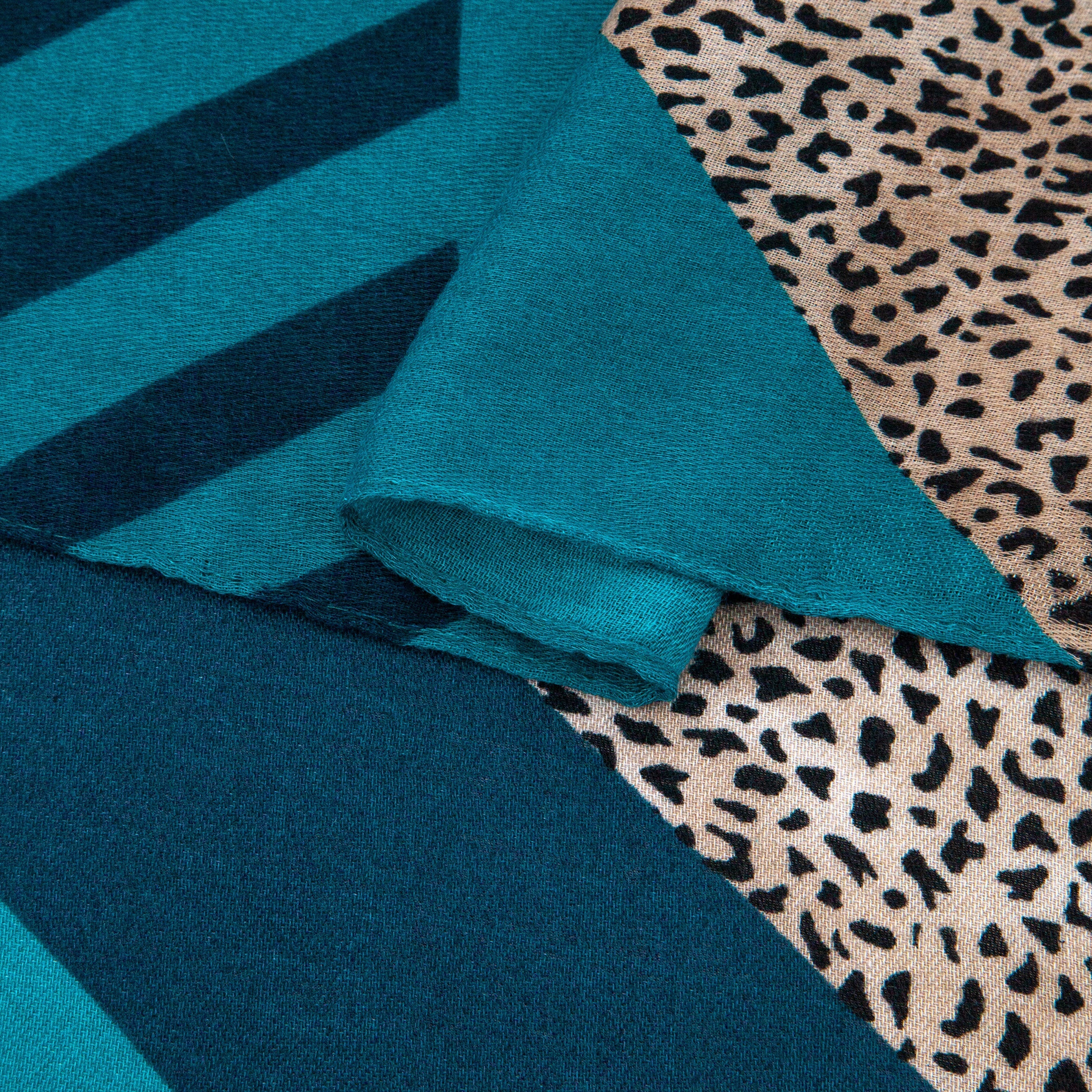 close up of the soft viscose fabric, the contrasting print is clearly visible