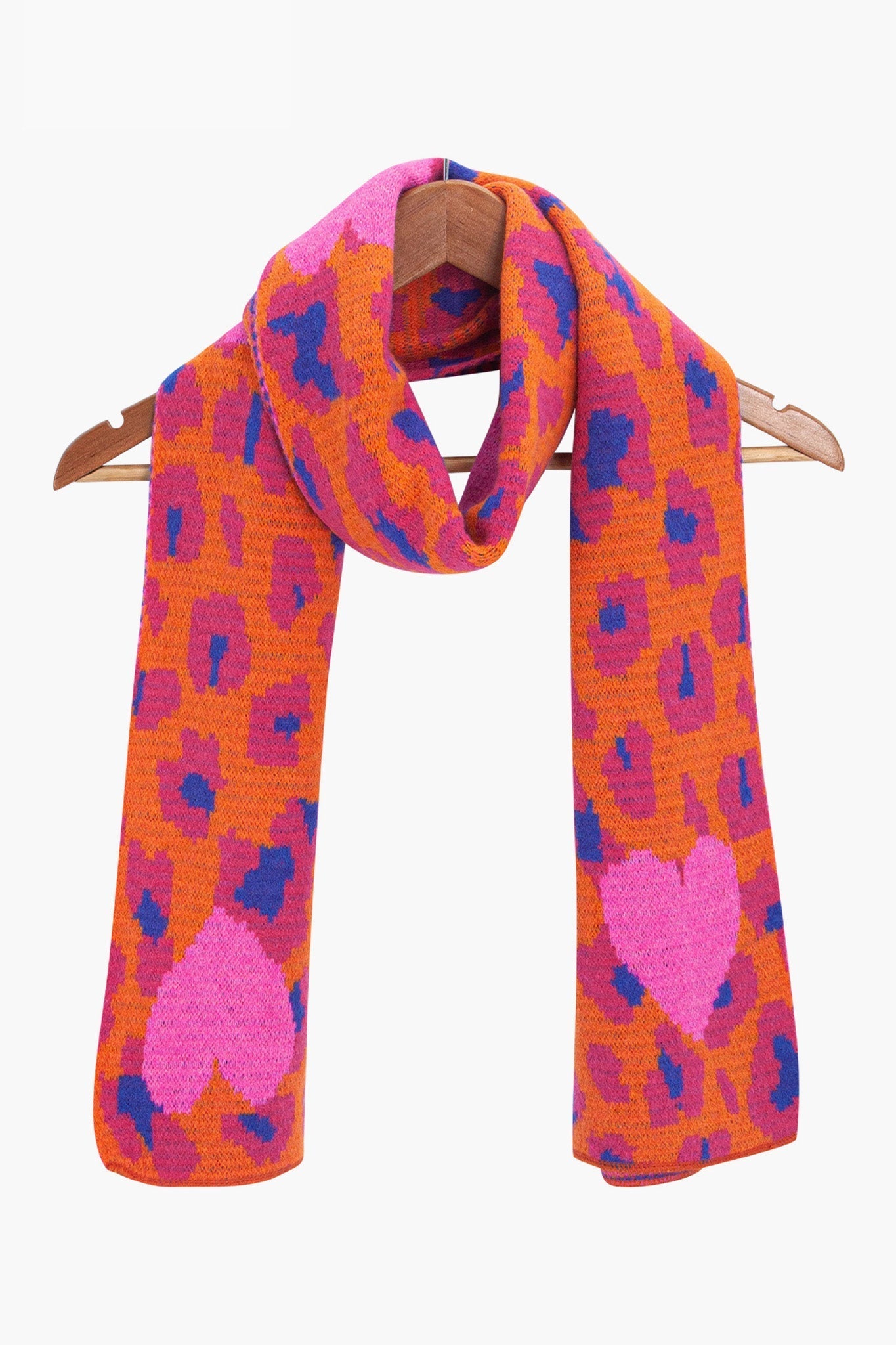 wylda-hot-pink-leopard-and-hearts-heavyweight-scarf-draped-on-coat-hanger