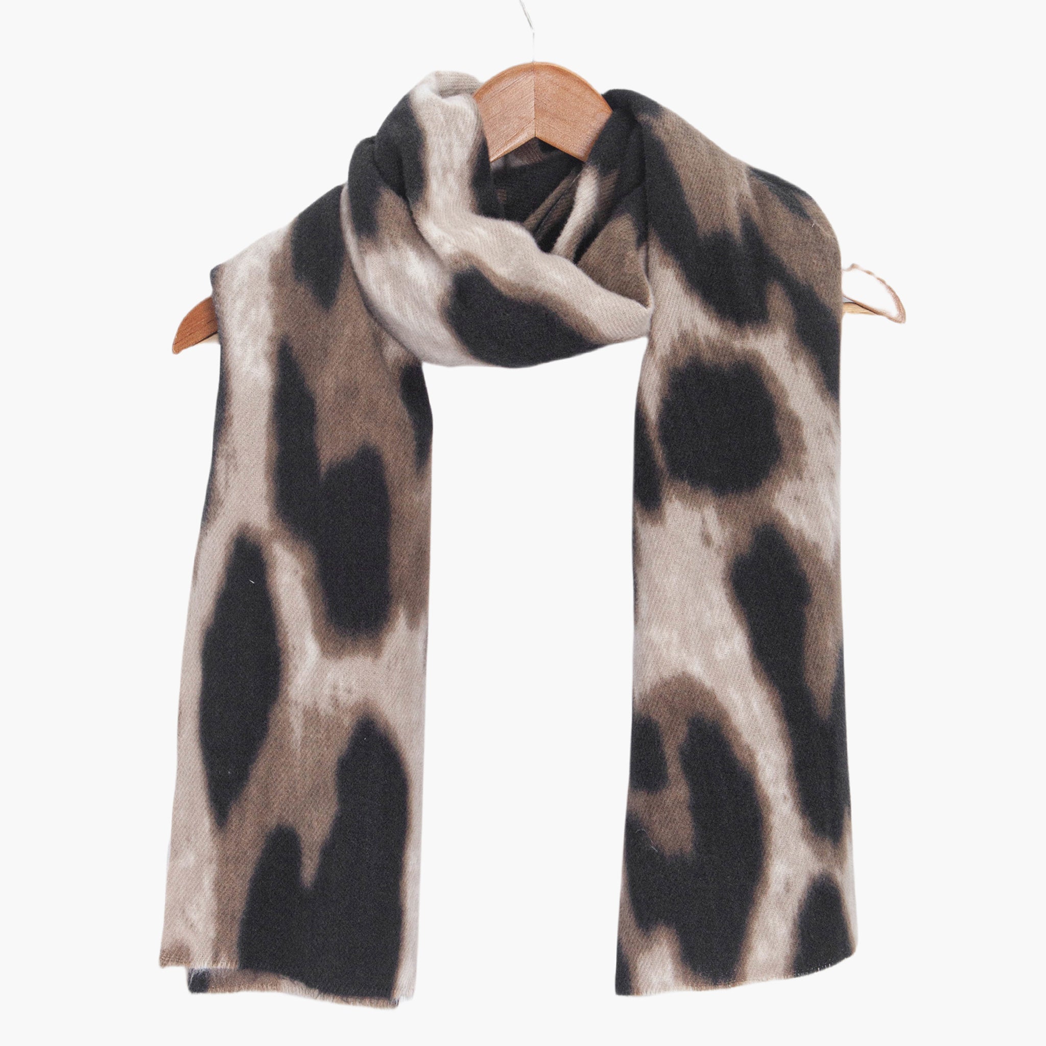 lois-neutral-leopard-lightweight-scarf-draped-on-coat-hanger