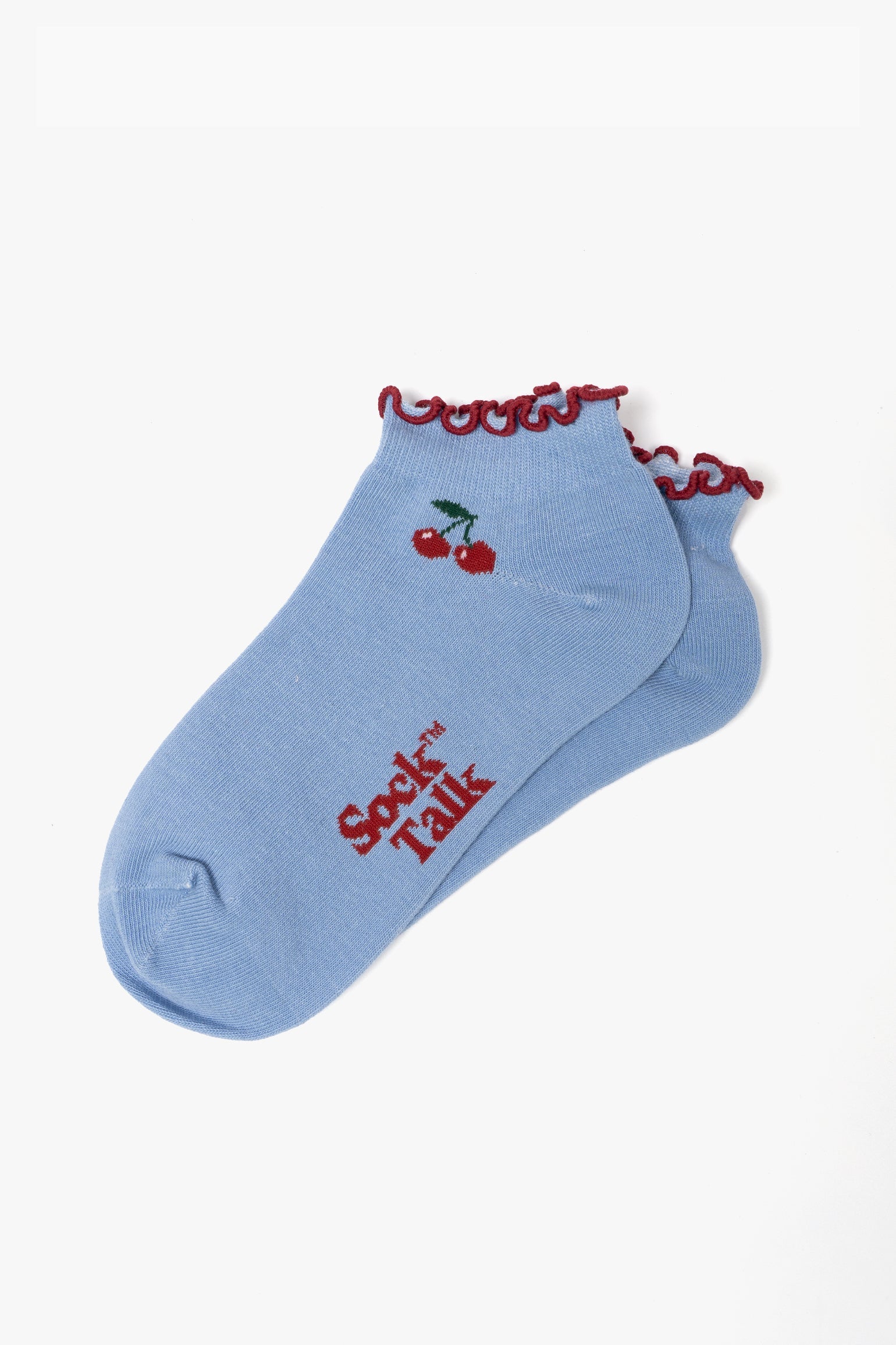 Cherry-Frilled-Cuff-Combed-Cotton-Trainer-Socks-in-Blue-Lying-Flat
