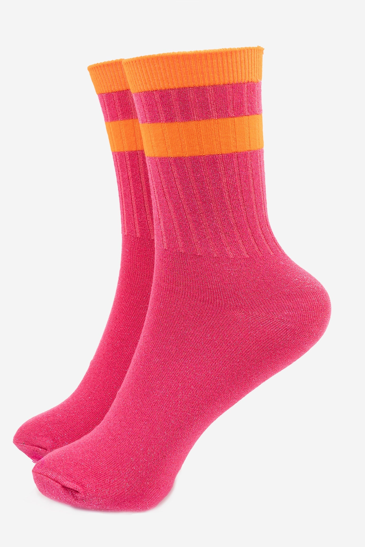 pink glitter sparkly ankle socks with ribbed cuffs and two sports style horizontal orange stripes on the cuff