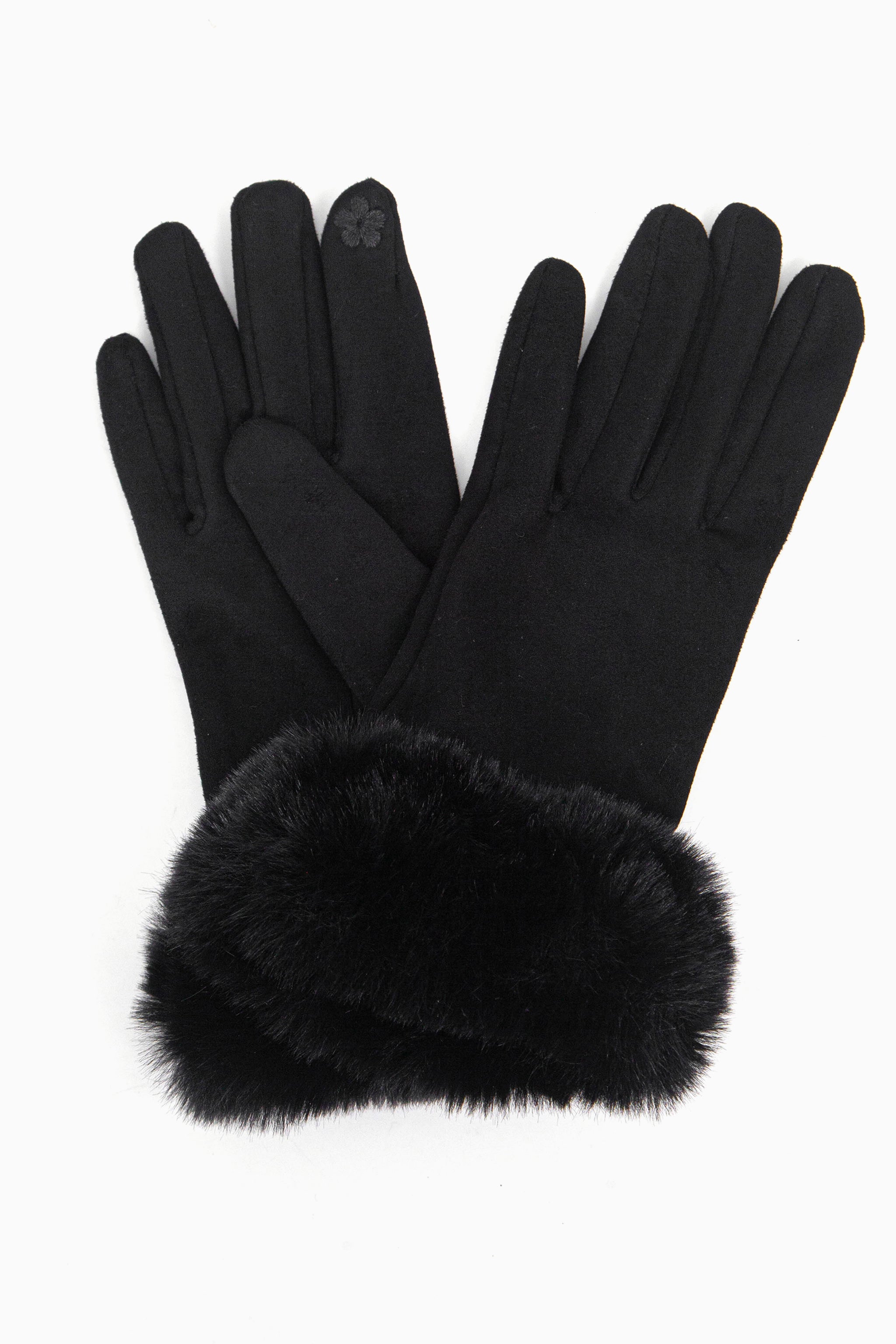 a close up of the velvet winter gloves showing up close the faux fur trim around the wrists.