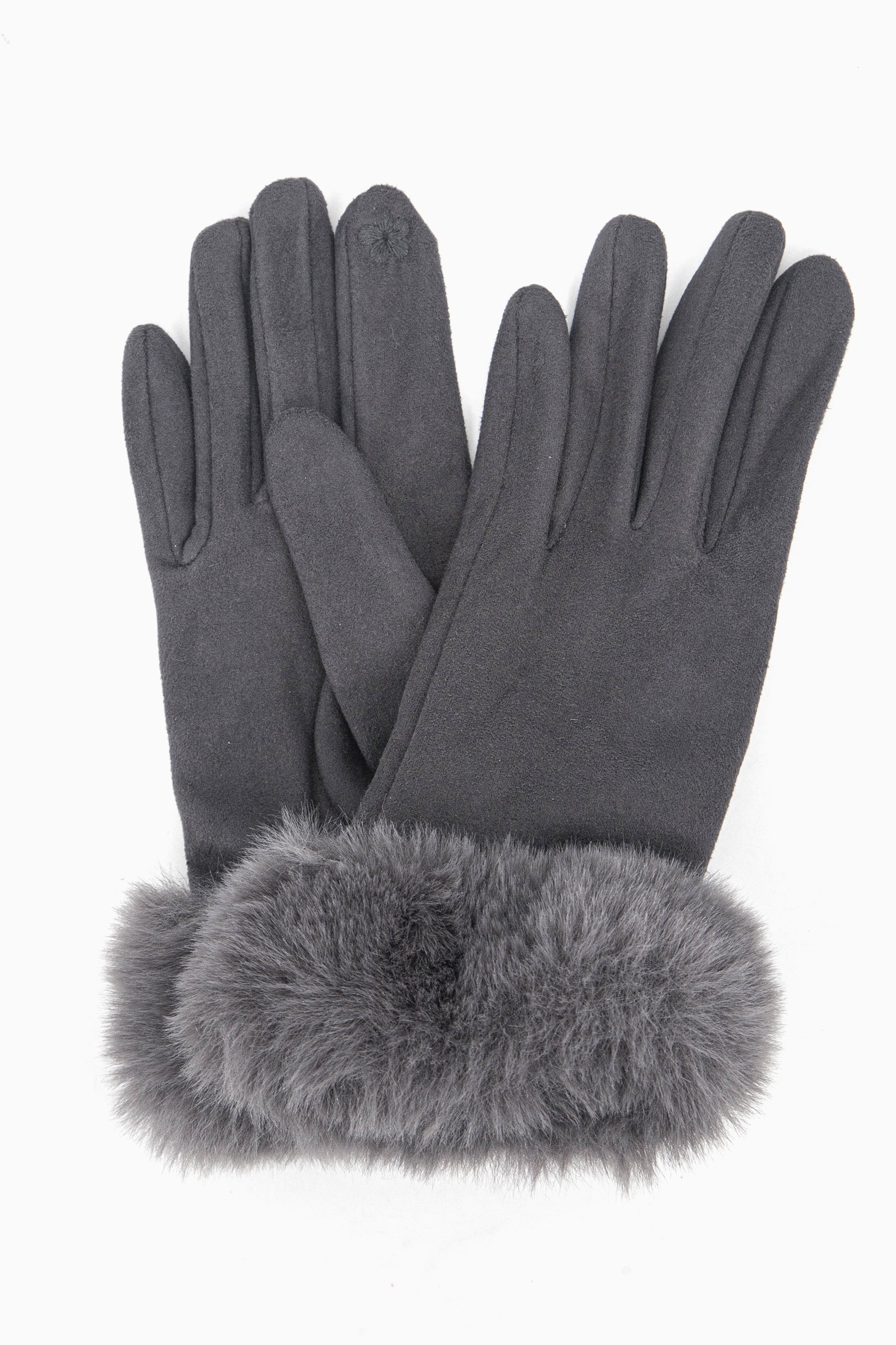 a close up of the velvet winter gloves showing up close the faux fur trim around the wrists.