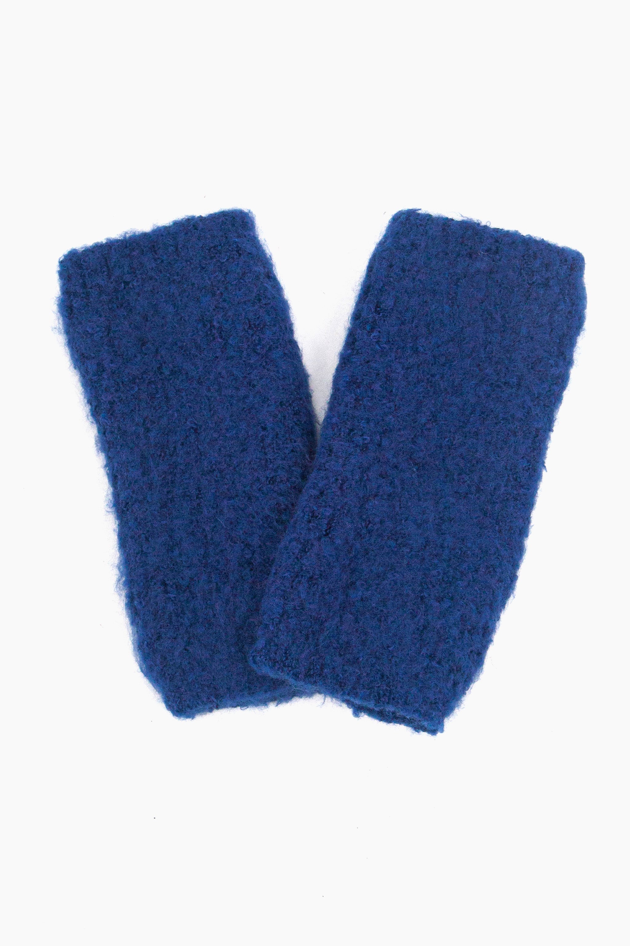 close up of the knitted wrist warmers showing the soft fabric