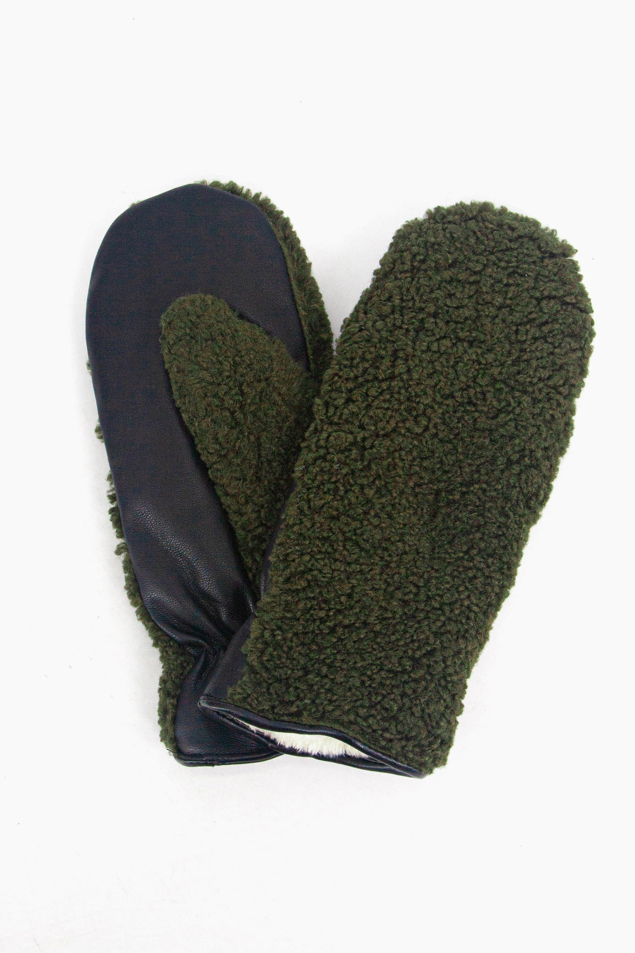 showing the gloves close up, there is an inner lining which is white, the trim around the edge of the cuffs is polyester. 