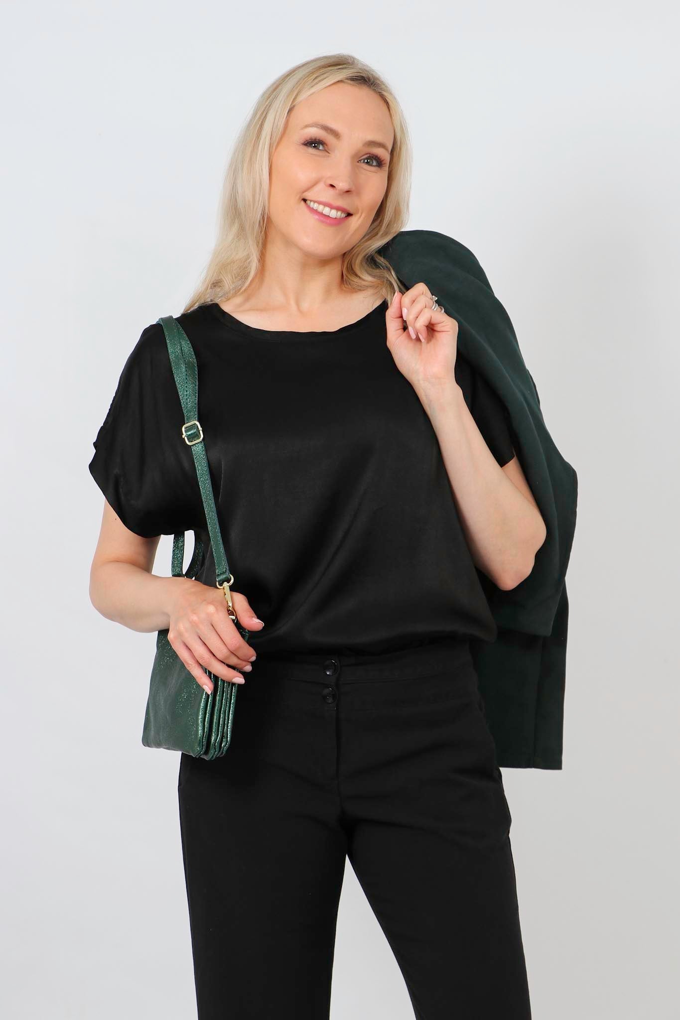 model wearing a short sleeve silk textured short sleeve top
