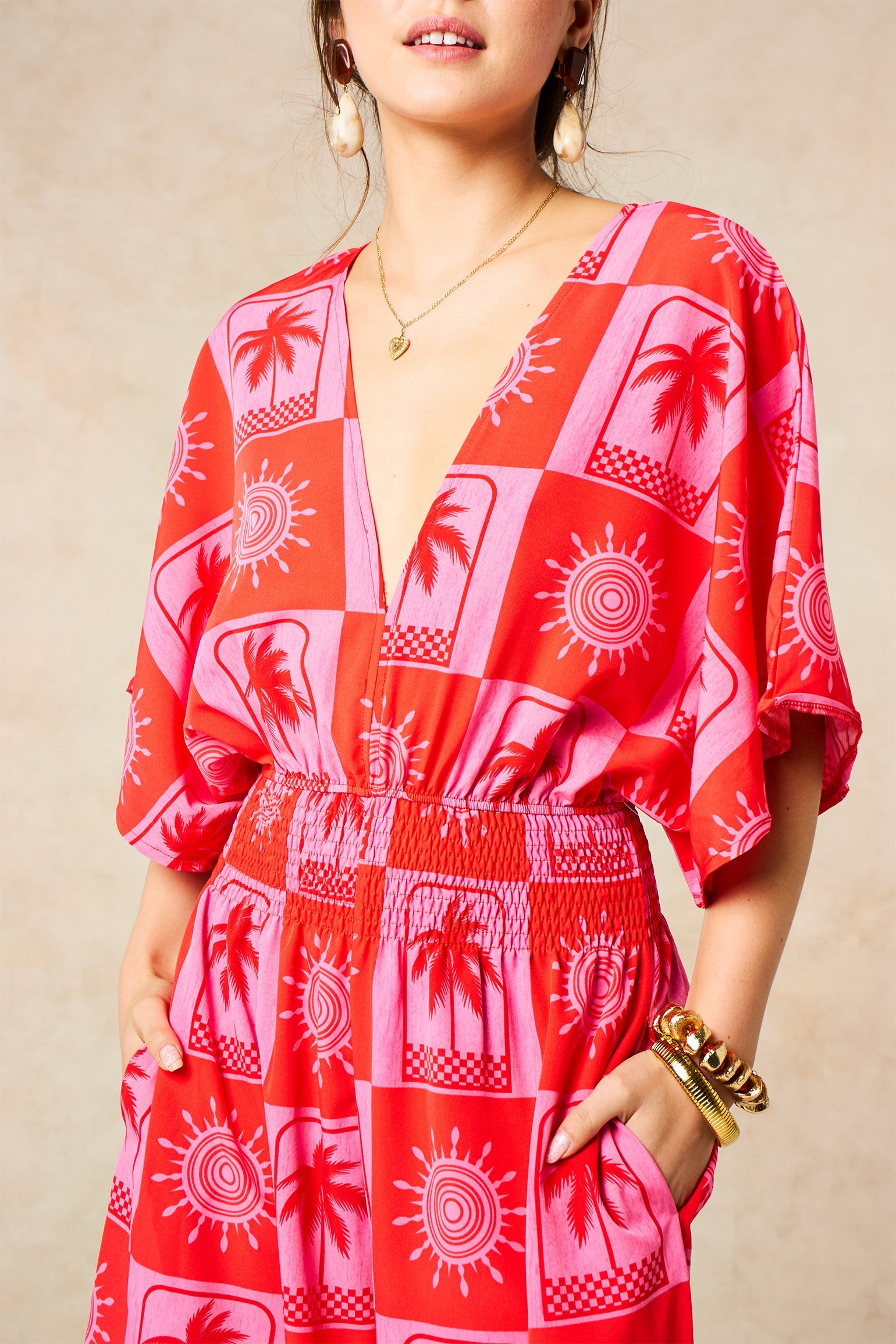 Palm-Tree-Checkerboard-V-Neck-Jumpsuit-in-Hot-Pink-Close-Up