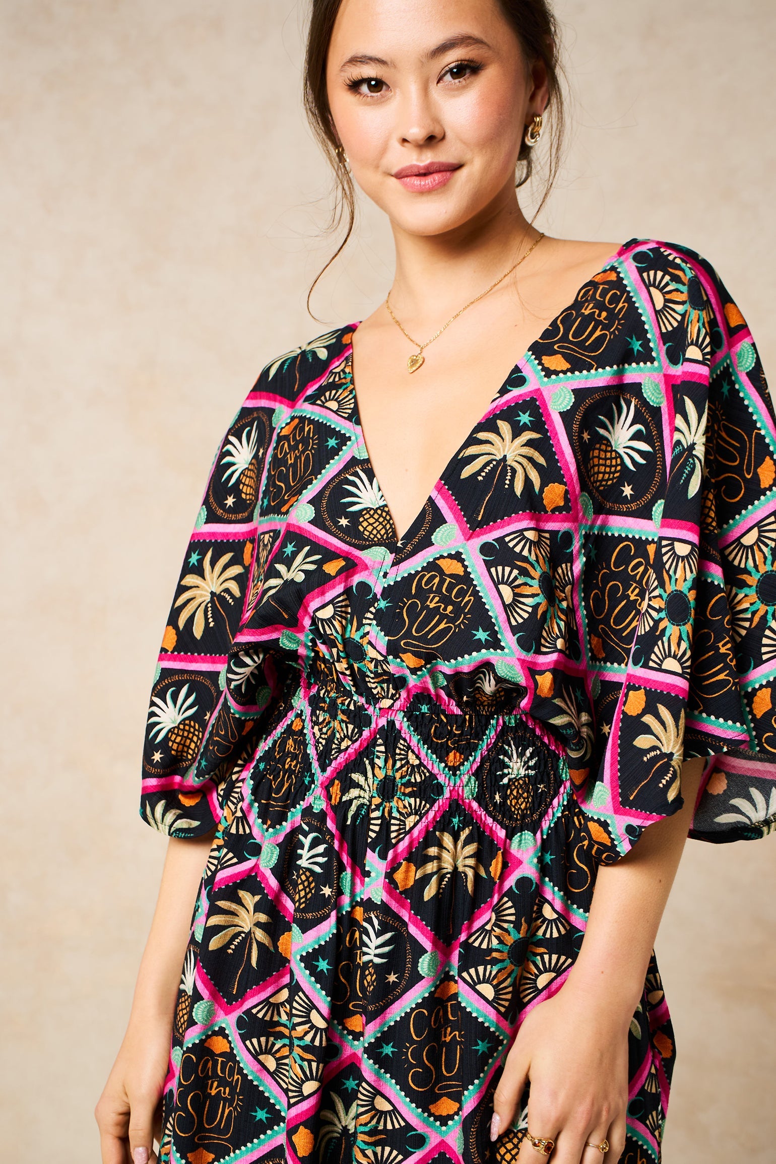Pineapple-Print-V-Neck-Jumpsuit-in-Black-Close-Up