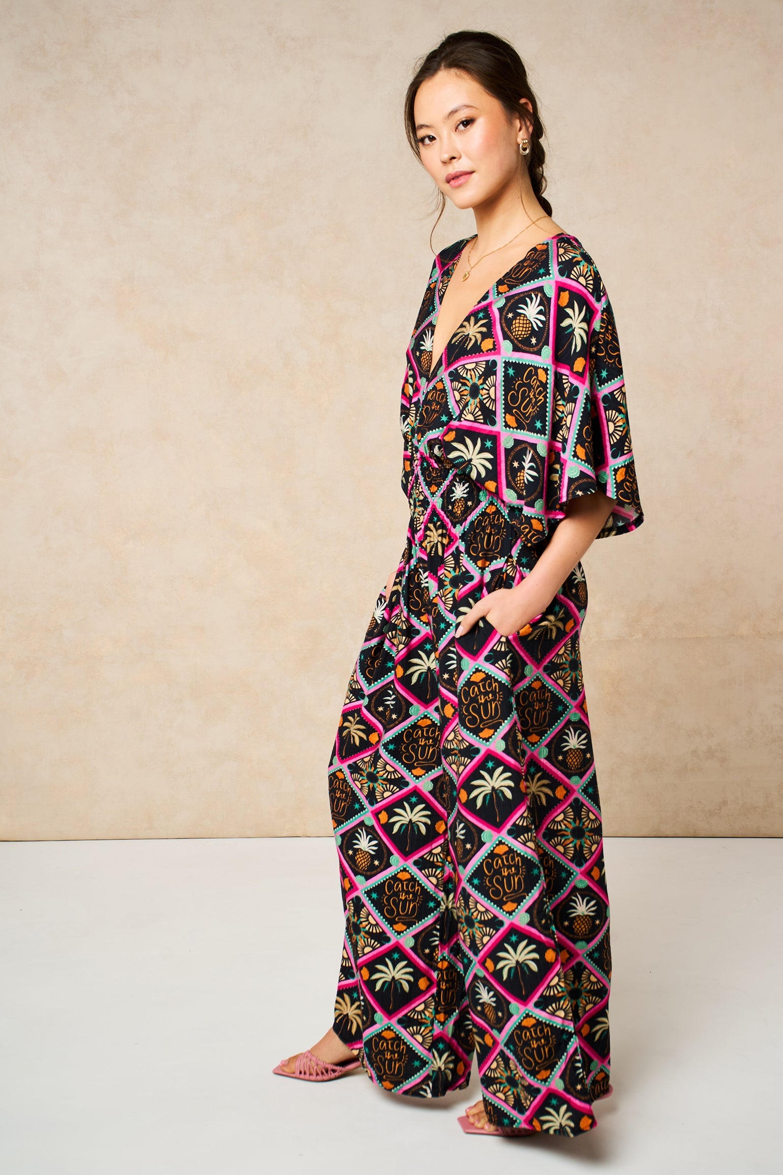 Pineapple-Print-V-Neck-Jumpsuit-in-Black-Side