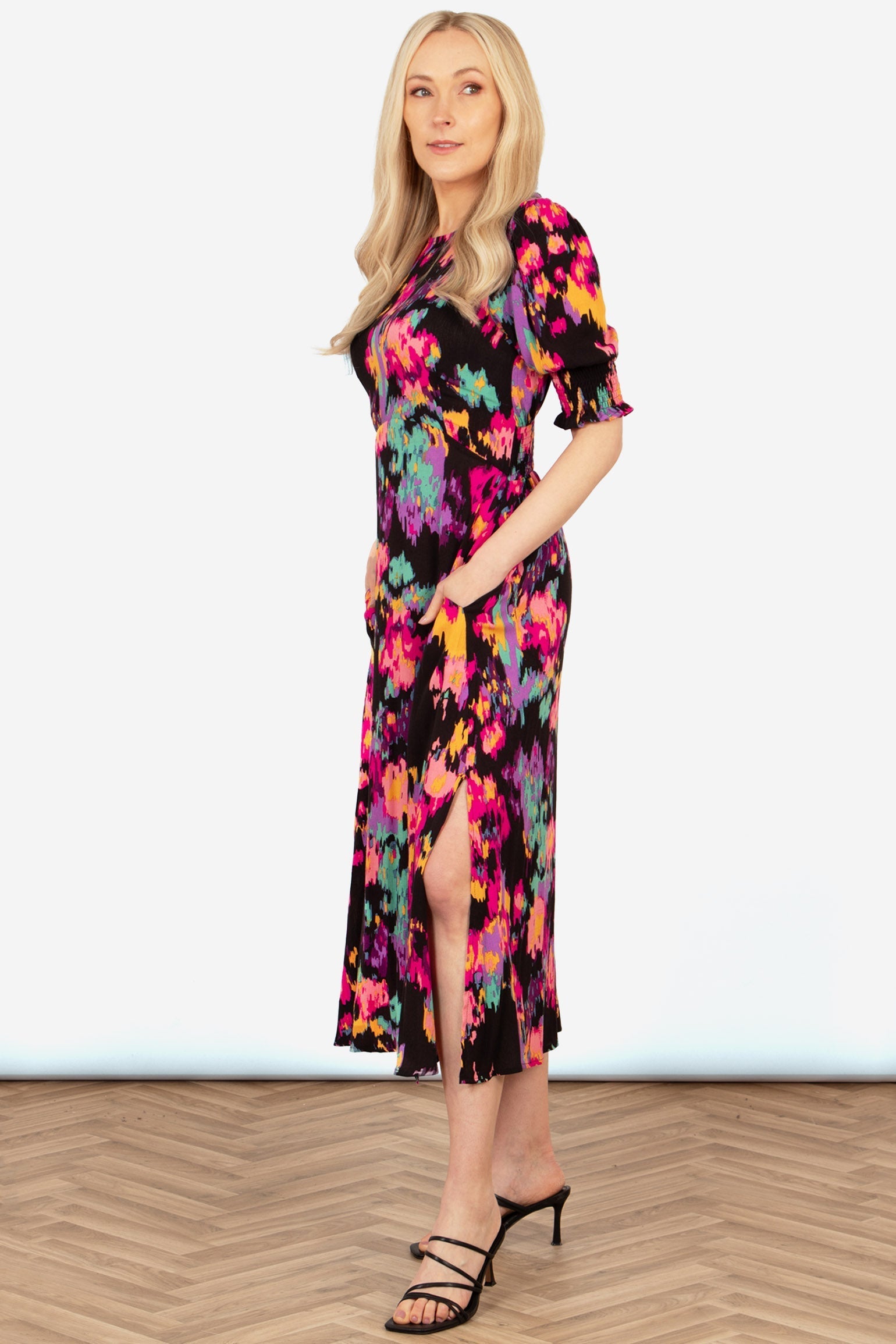 hazel-midi-tea-dress-black-multi-abstract-floral-showing-side-split