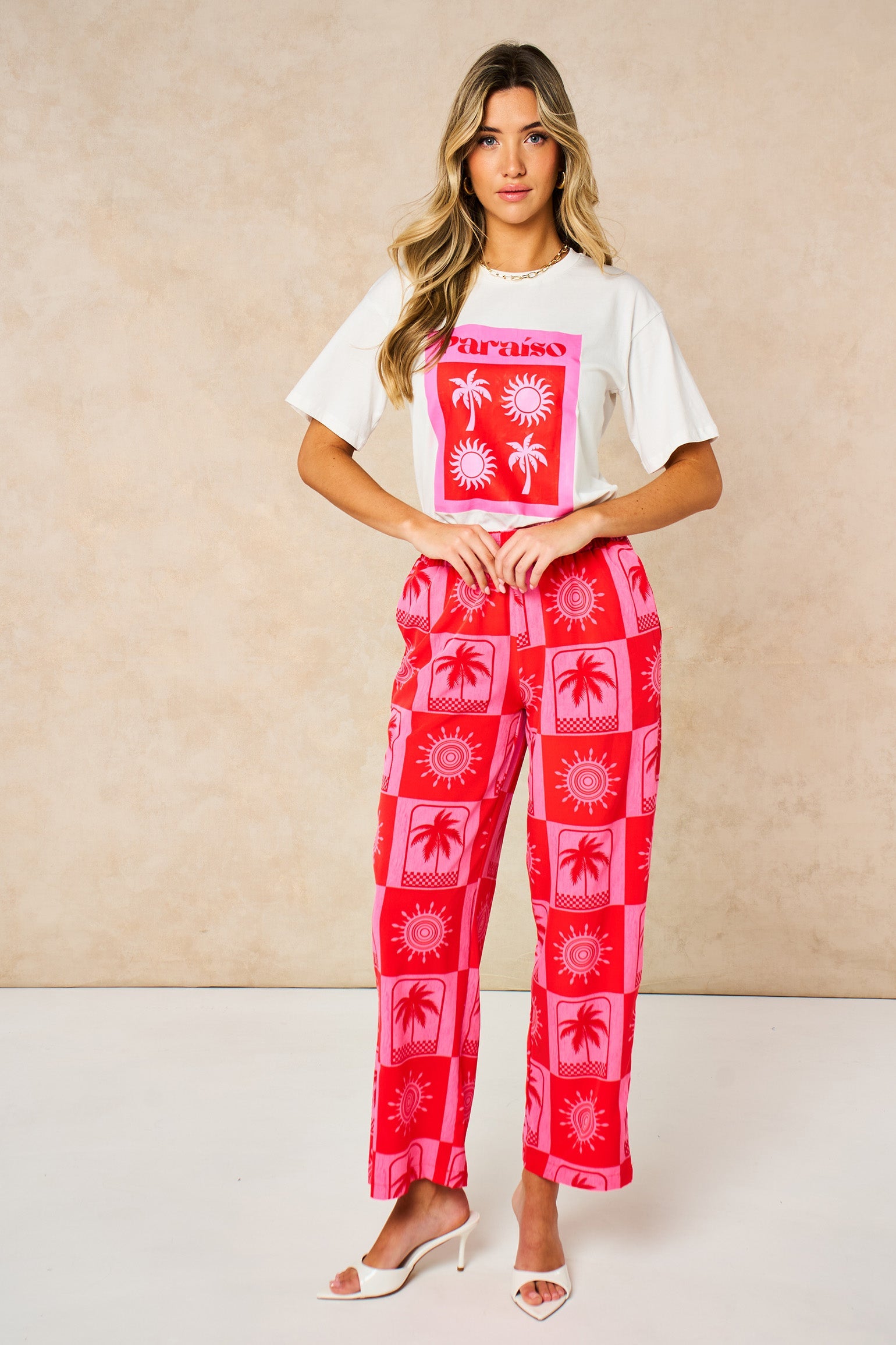 Sun-&-Palm-Tree-Wide-Leg-Trousers-in-Hot-Pink-posed