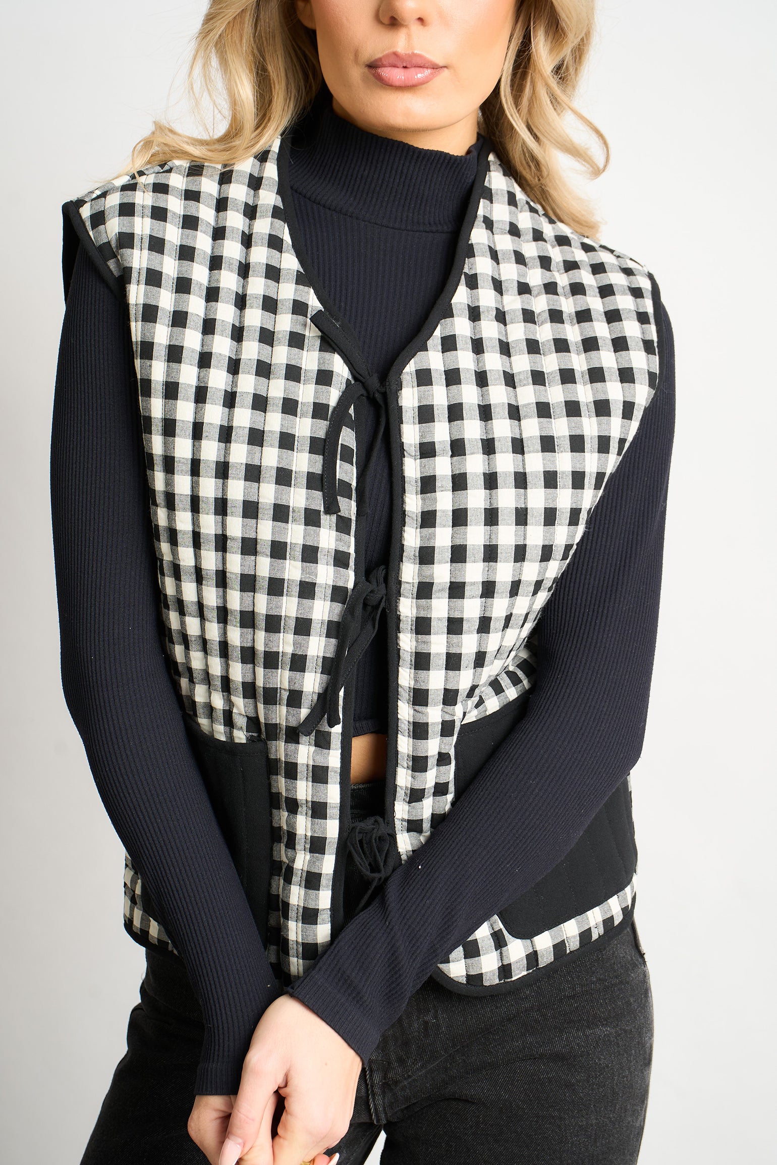 tabby-quilted-reversible-gilet-black-cream-gingham