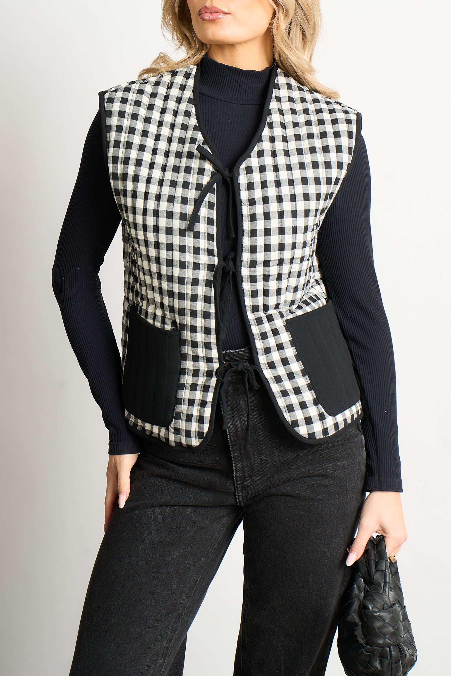 tabby-quilted-reversible-gilet-black-cream-gingham