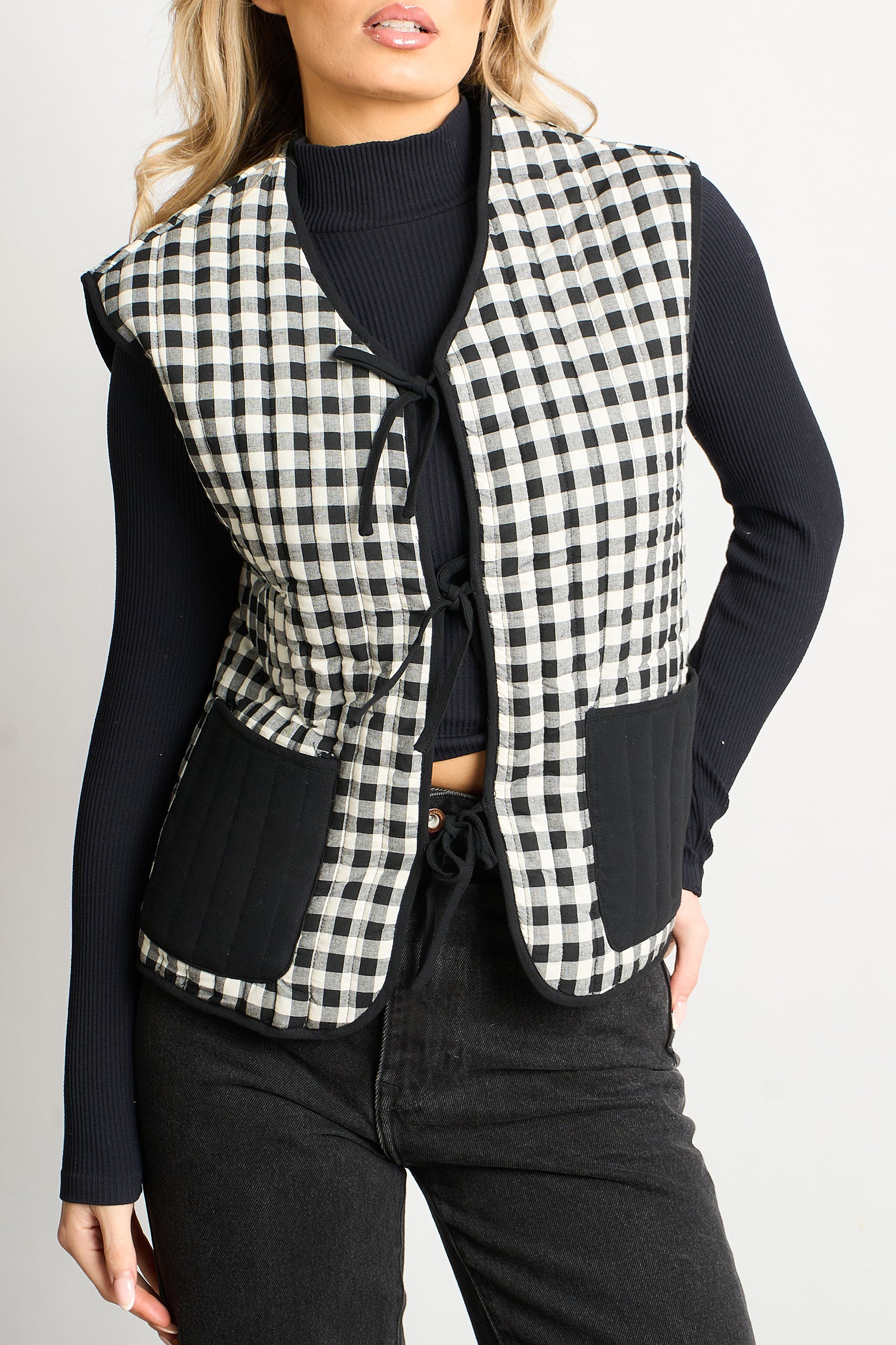 tabby-quilted-reversible-gilet-black-cream-gingham