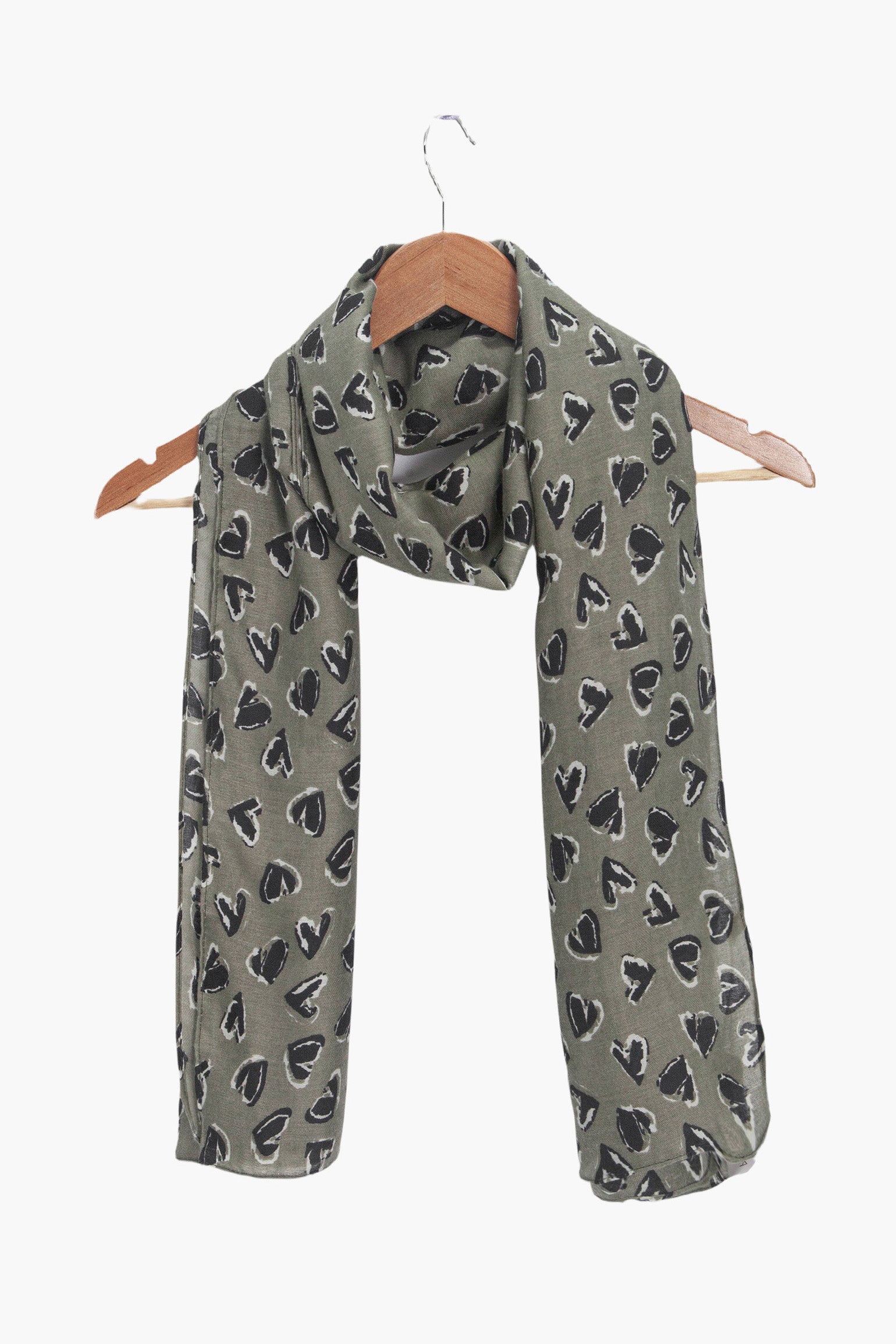 kara-khaki-black-hearts-lightweight-scarf-draped-on-coat-hanger
