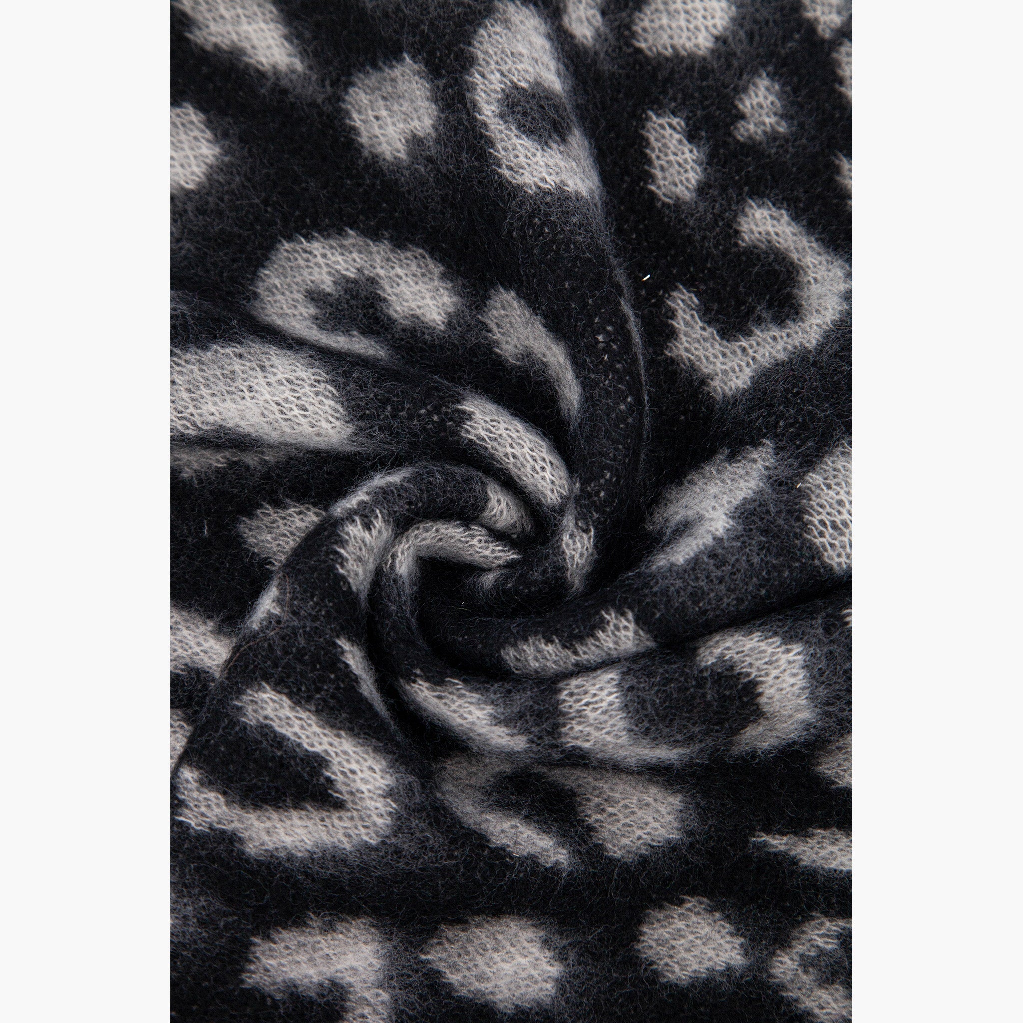 nico-black-white-leopard-heavyweight-scarf-close-up-knitted-material