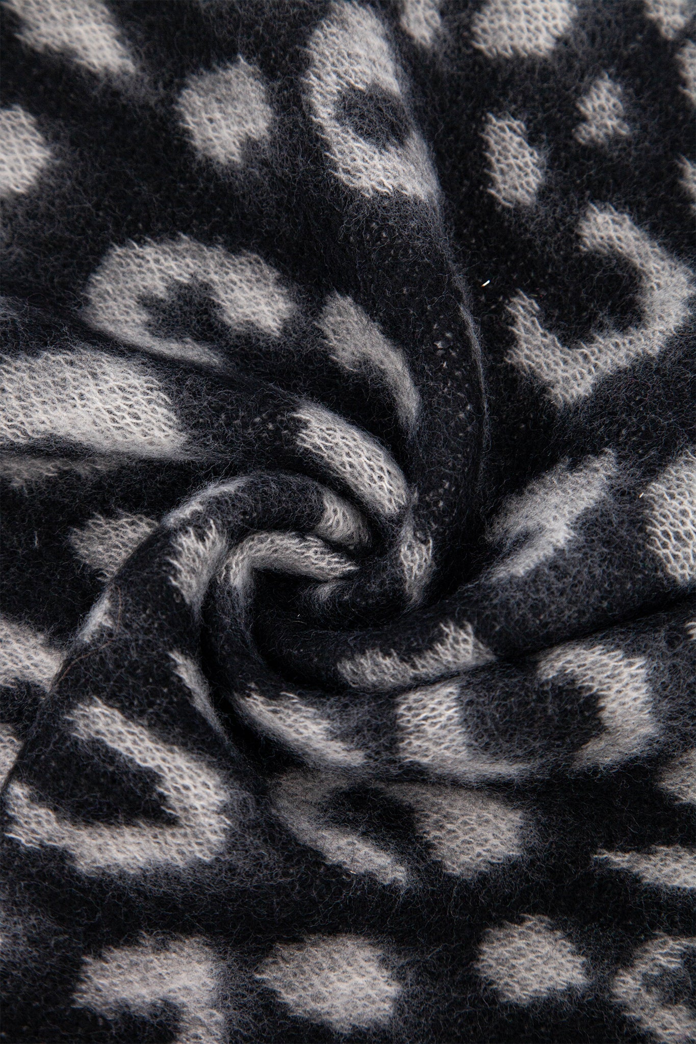 nico-black-white-leopard-heavyweight-scarf-close-up-knitted-material