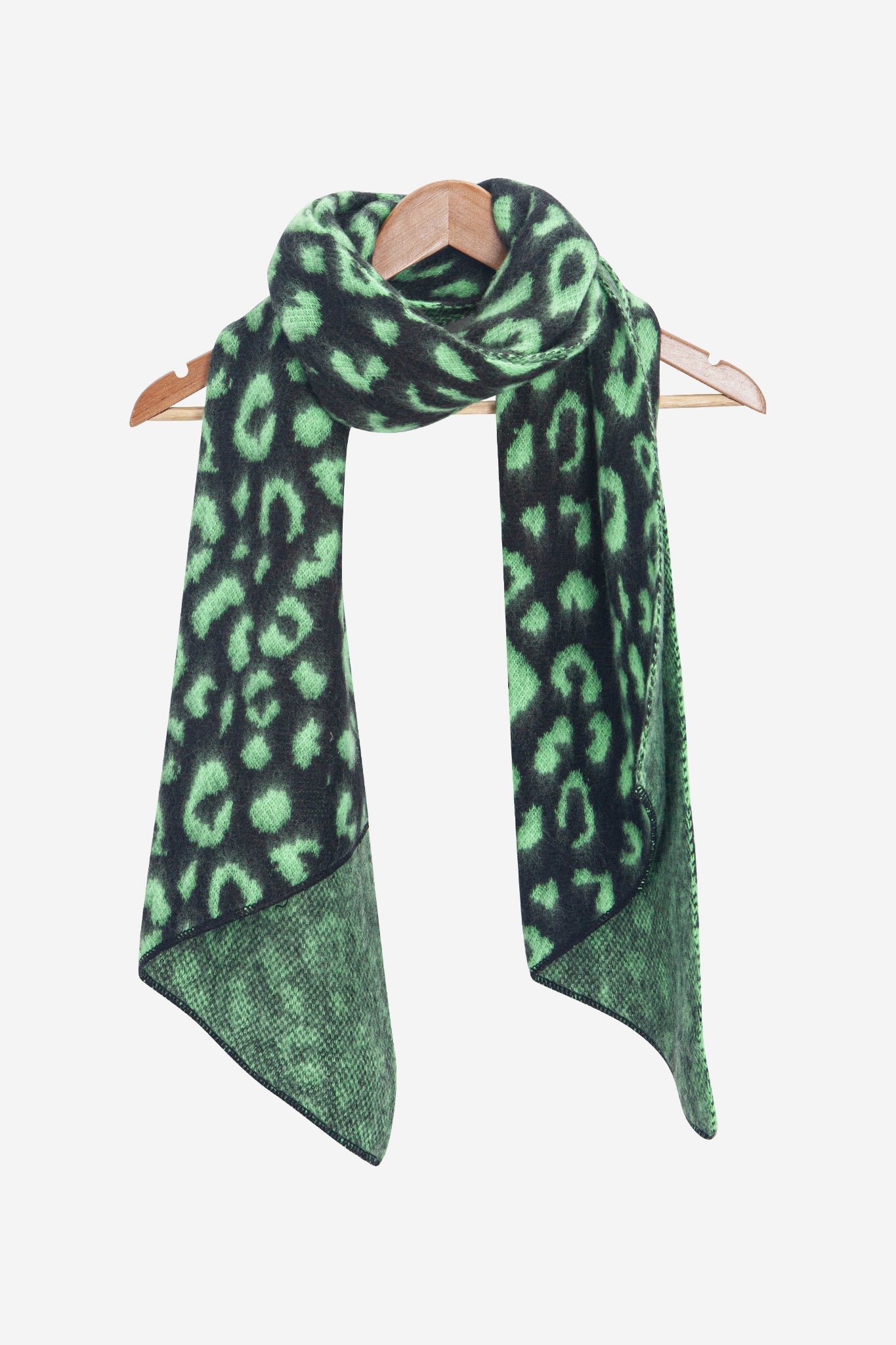 nico-black-lime-leopard-heavyweight-scarf-draped-on-coat-hanger