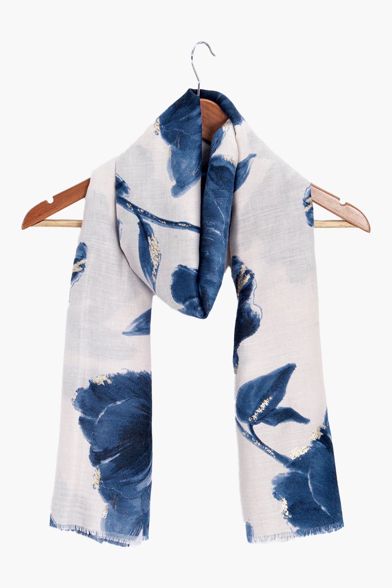 eleanor-blue-abstract-floral-lightweight-scarf-draped-on-coat-hanger